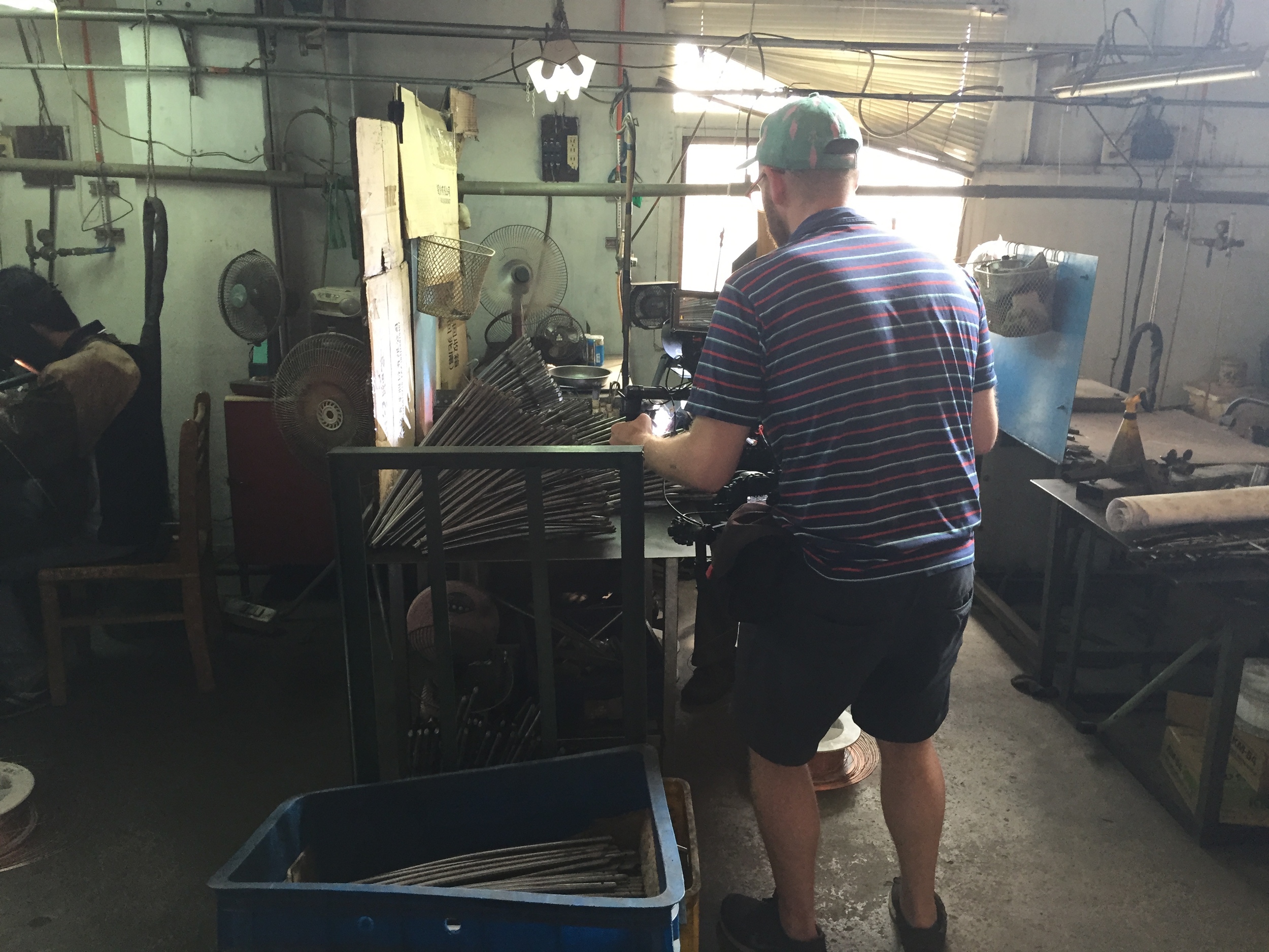 Jacob filming some welding.