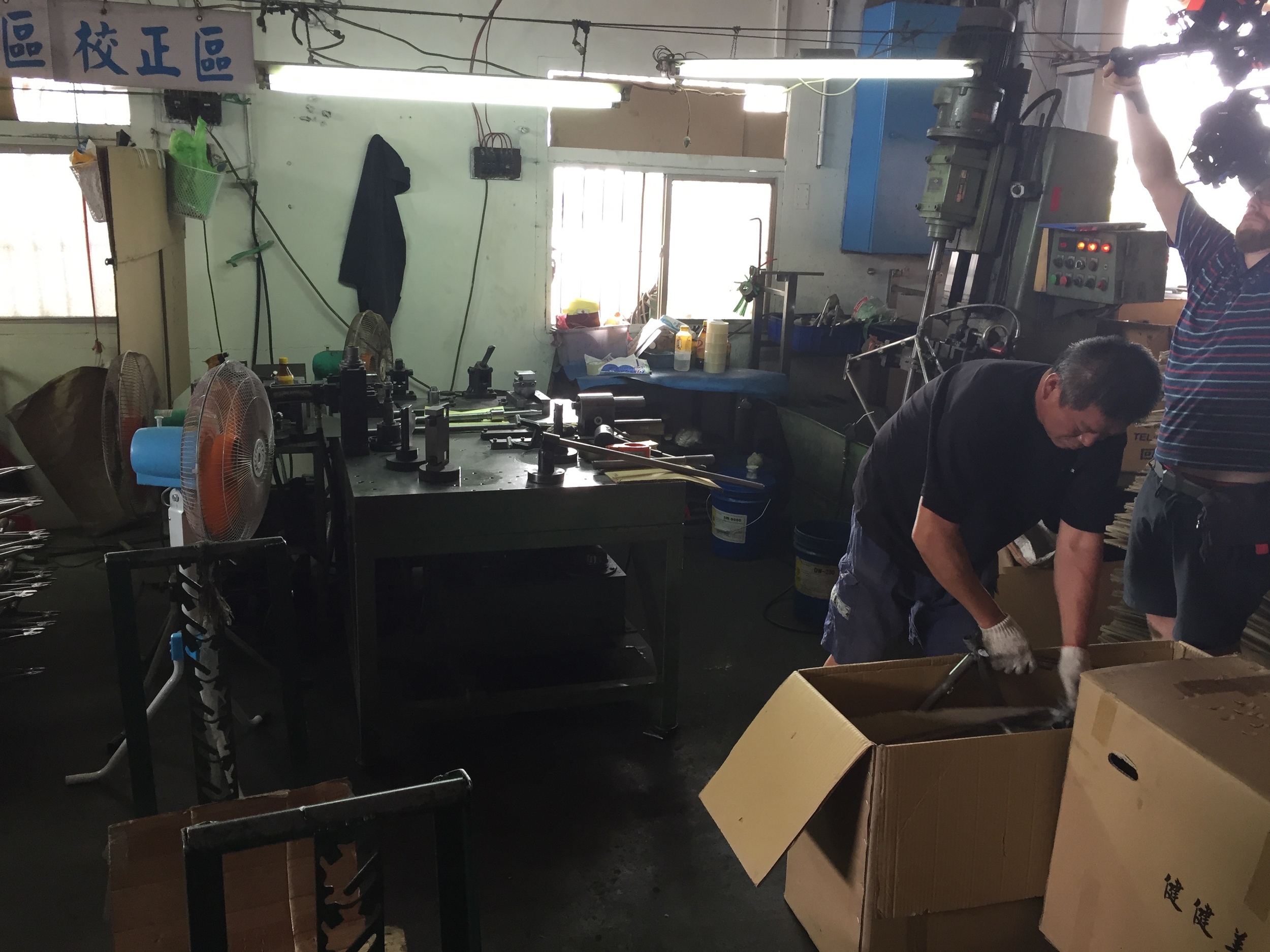 The alignment guy puts a frame in a box. This guy was *great* - he would align a frame and ream its seat tube in under 2 minutes. It was really cool.
