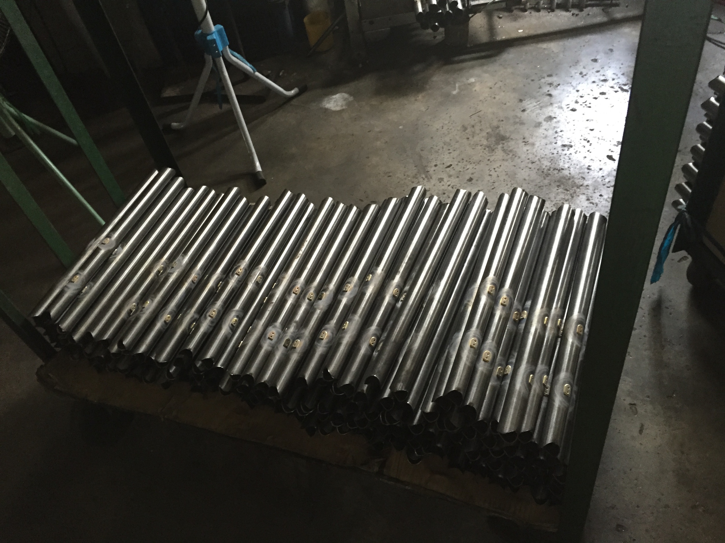 Tubes with braze-ons installed. I used to do braze-ons last, but they were doing them before welding; I suspect this would be more efficient in a production setting.