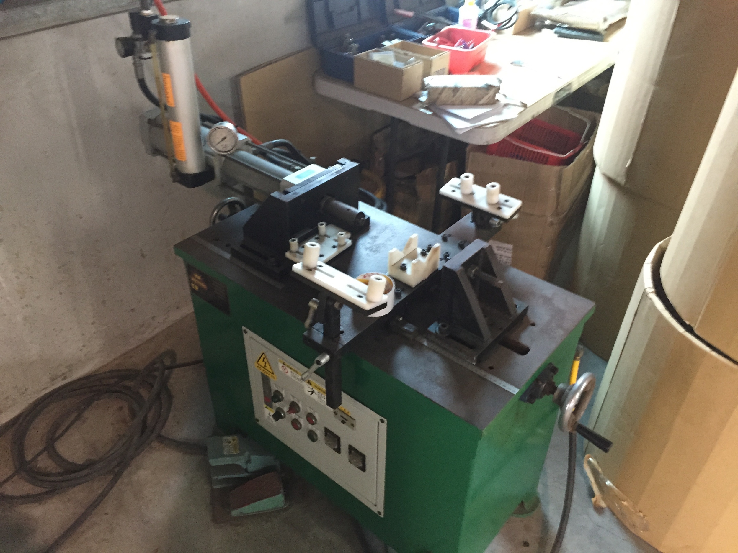 Darn, I forget what this machine does. It's made by Shuz Tung.
