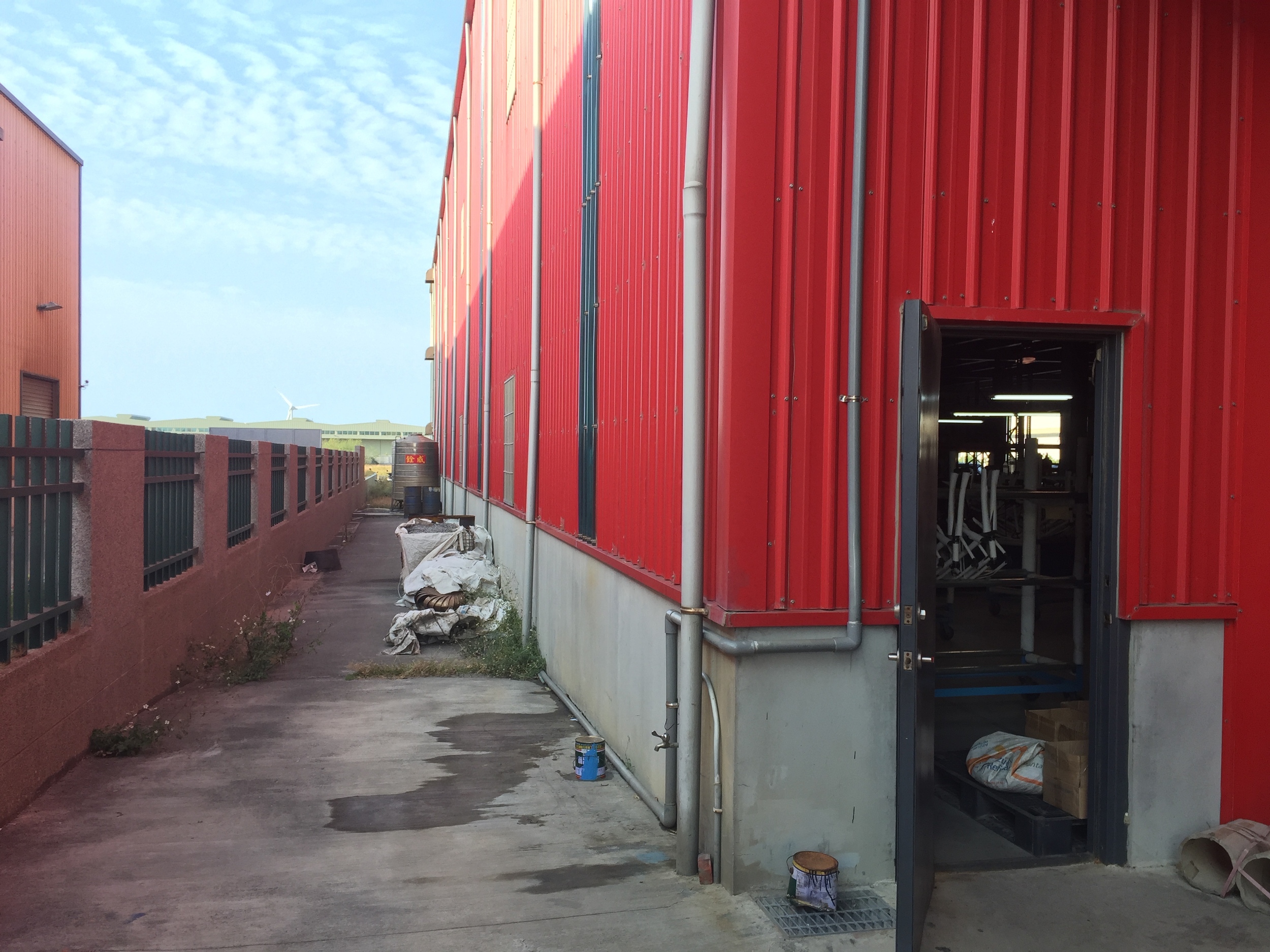 The outside of the shop. There was a wind power installation nearby.