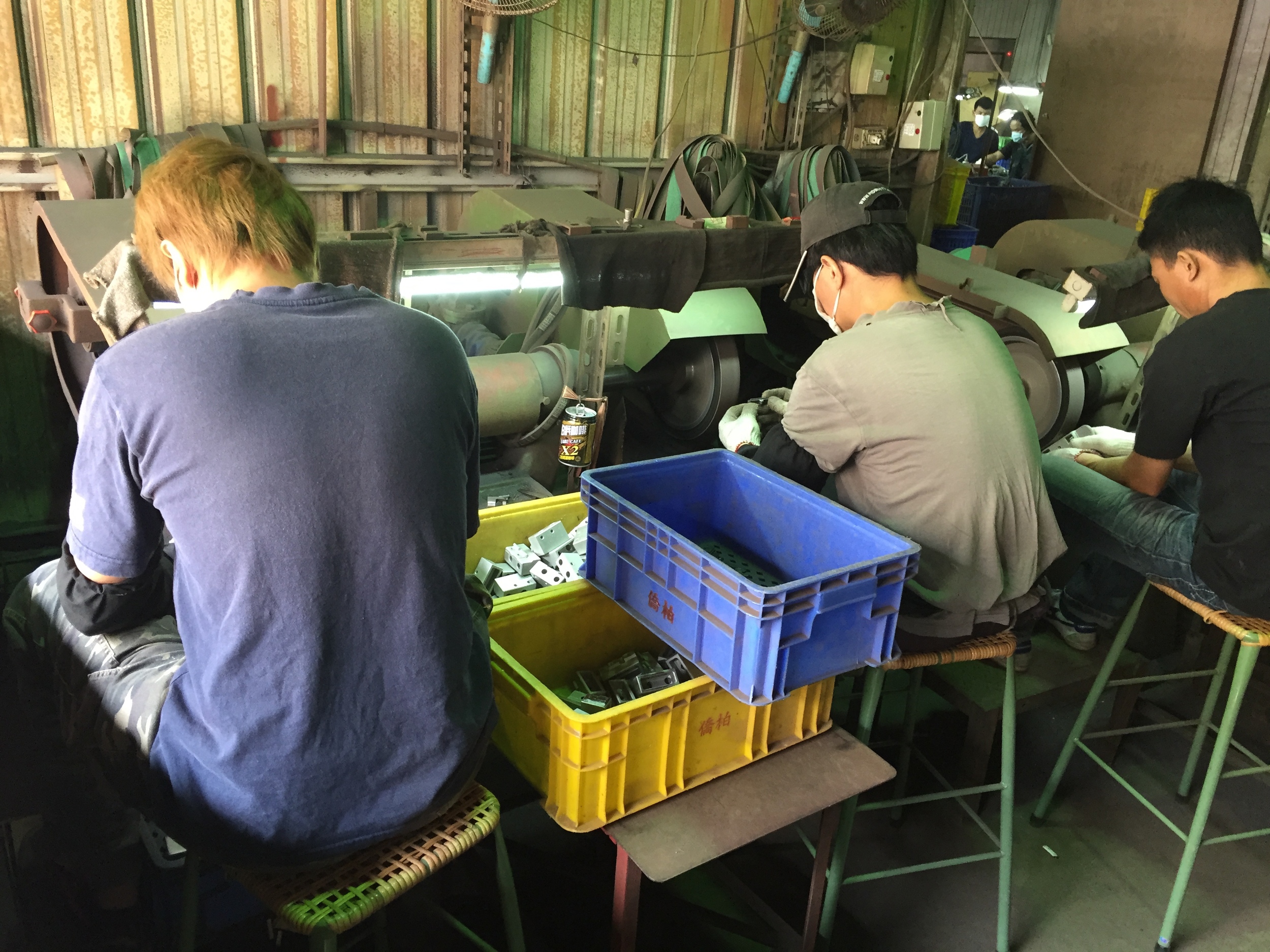 QC. These guys were working hard, checking multiple different aspects of each part.