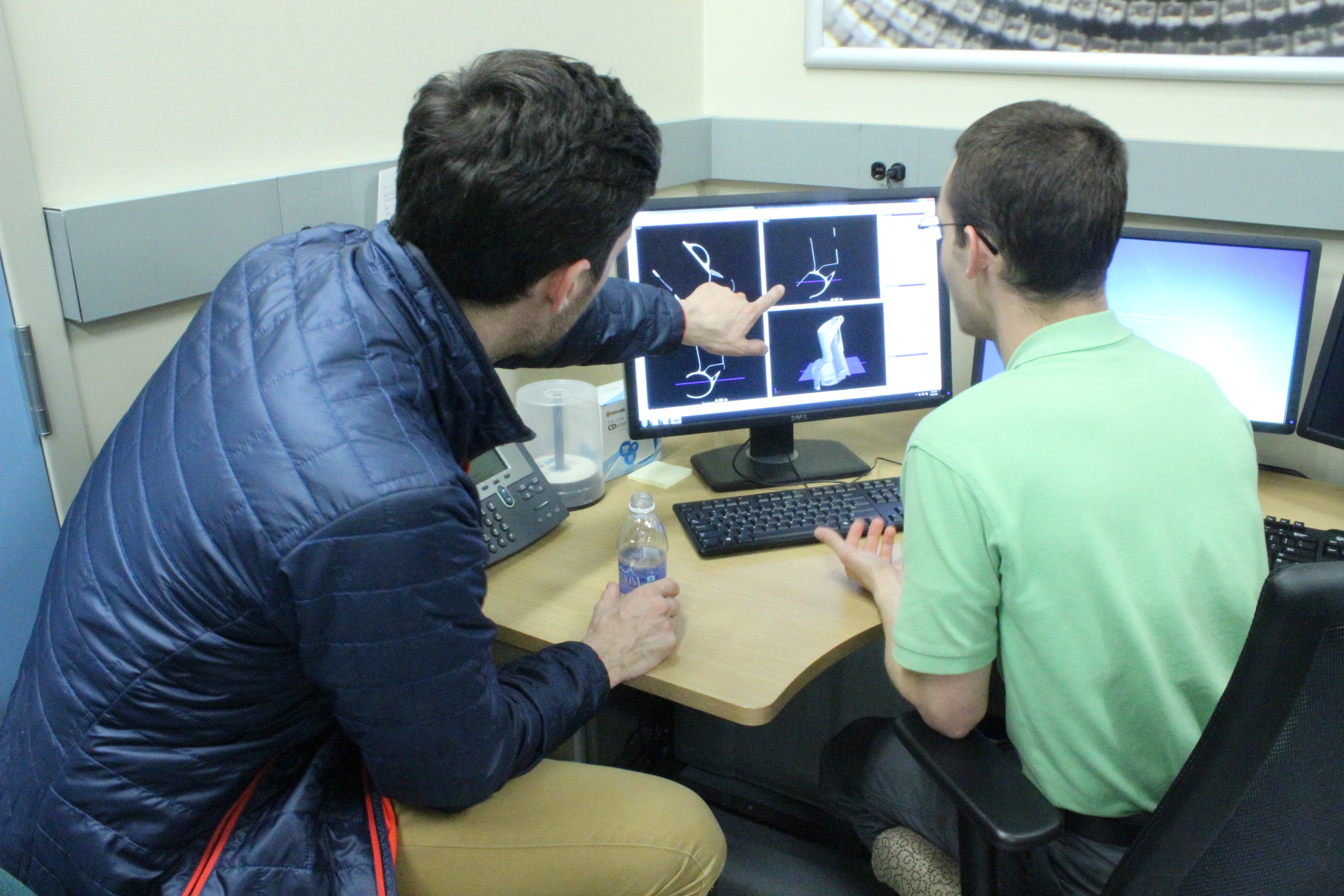  This is the obligatory photo of me pointing at the monitor while Griffin explains what I'm looking at. 