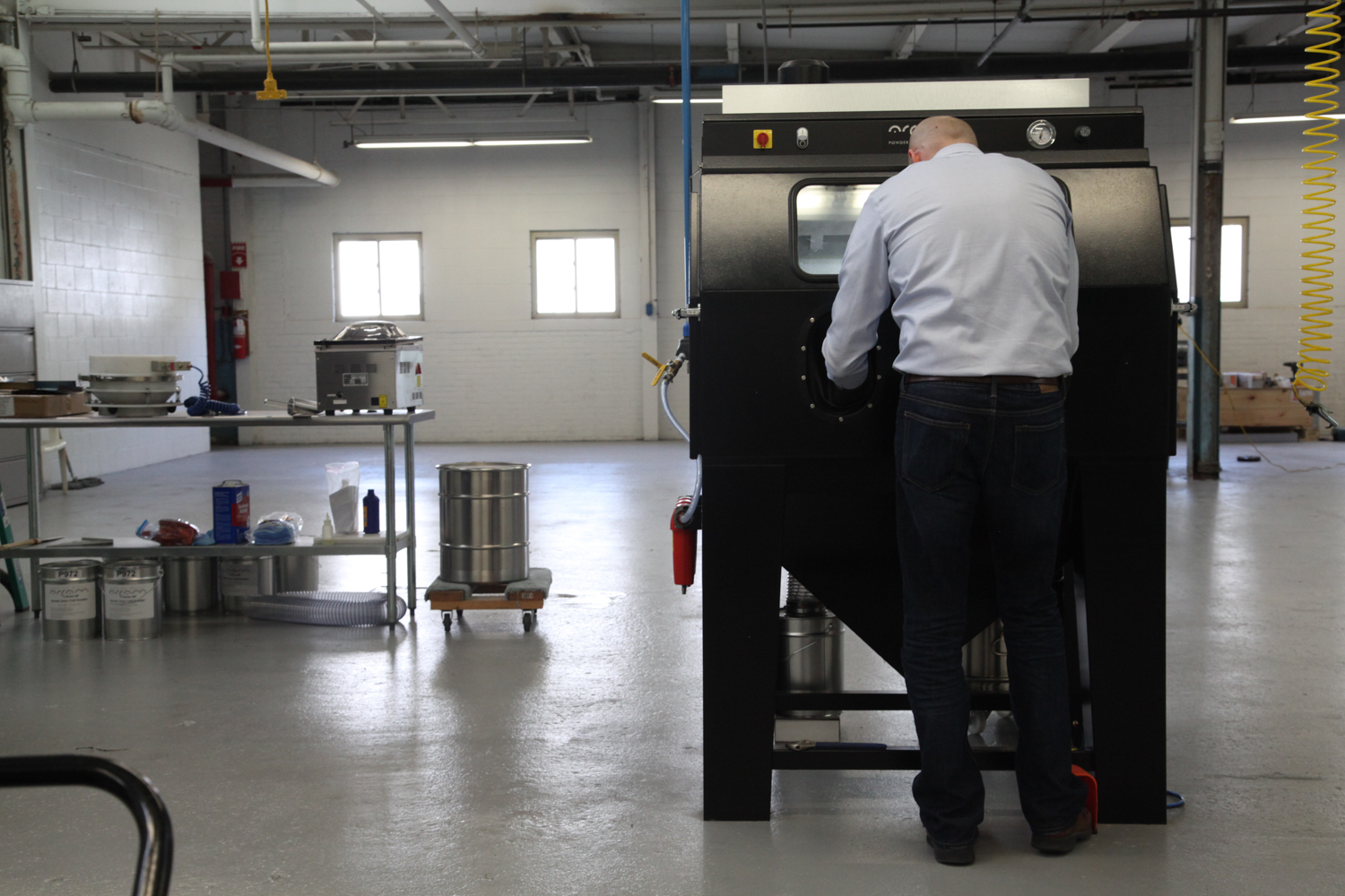 Dave using the media blast cabinet