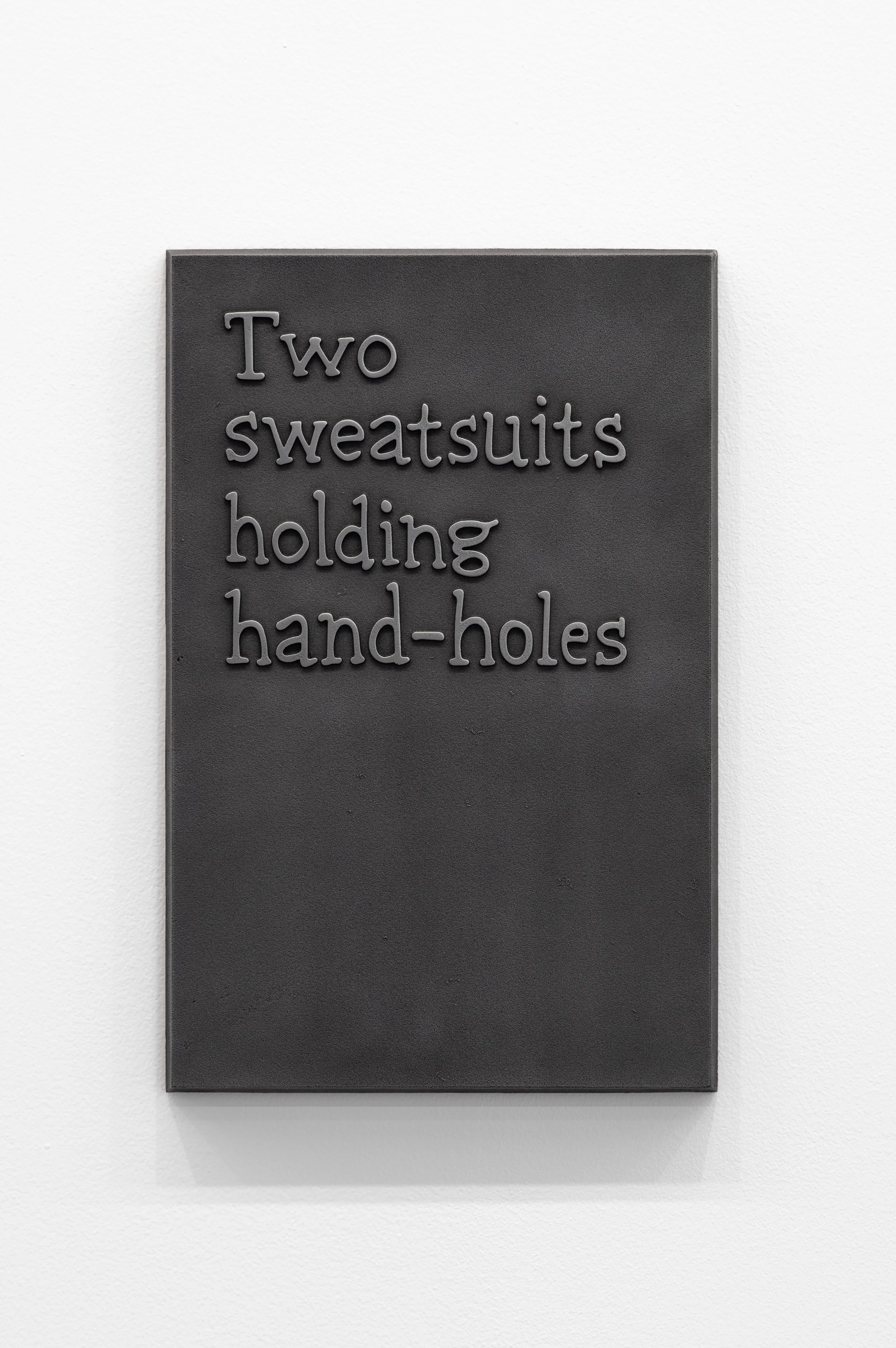 14_Two sweatsuits holding hand-holes-1.jpg