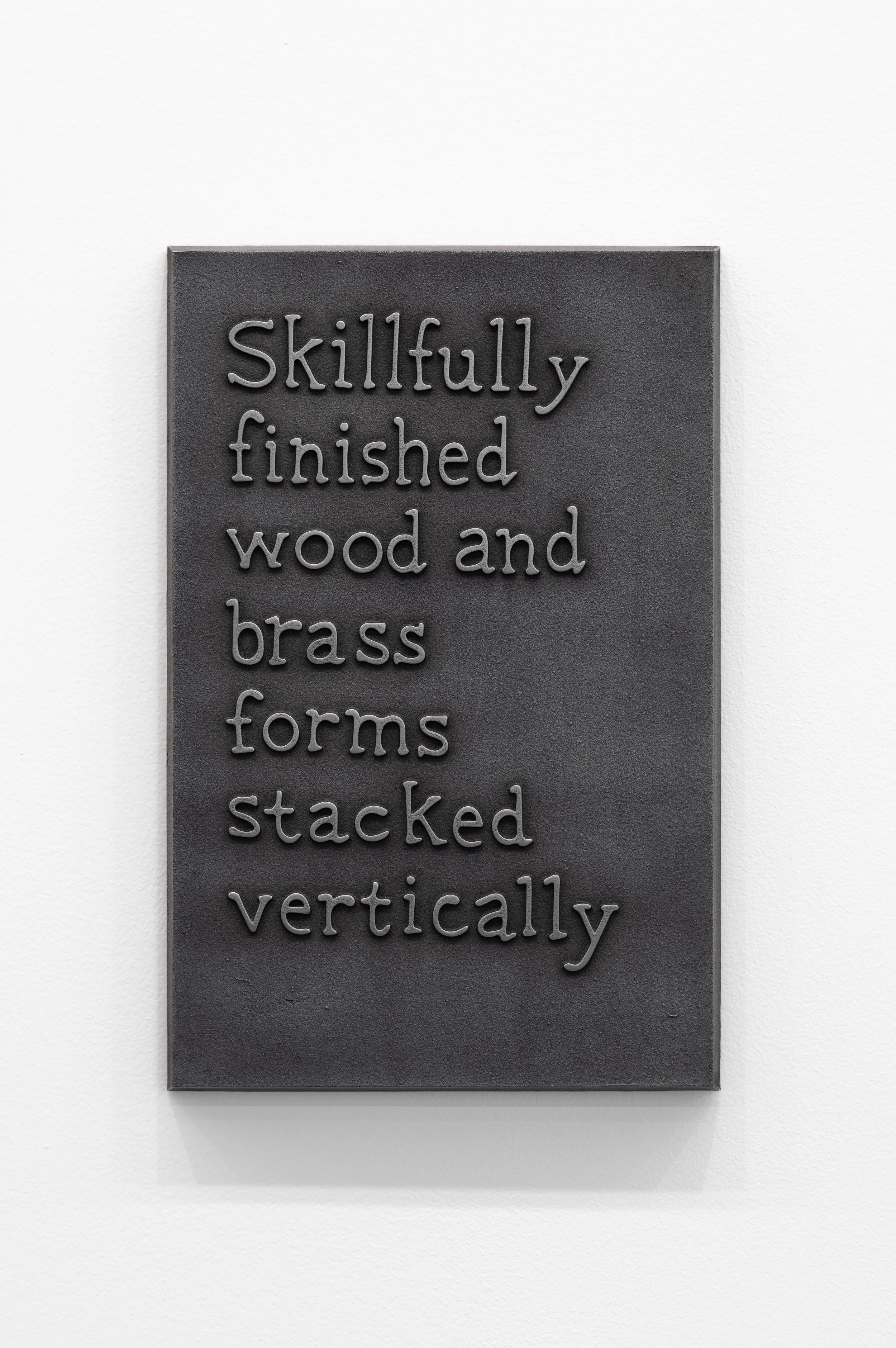 31_Skillfully finished wood and brass forms stacked vertically-1.jpg