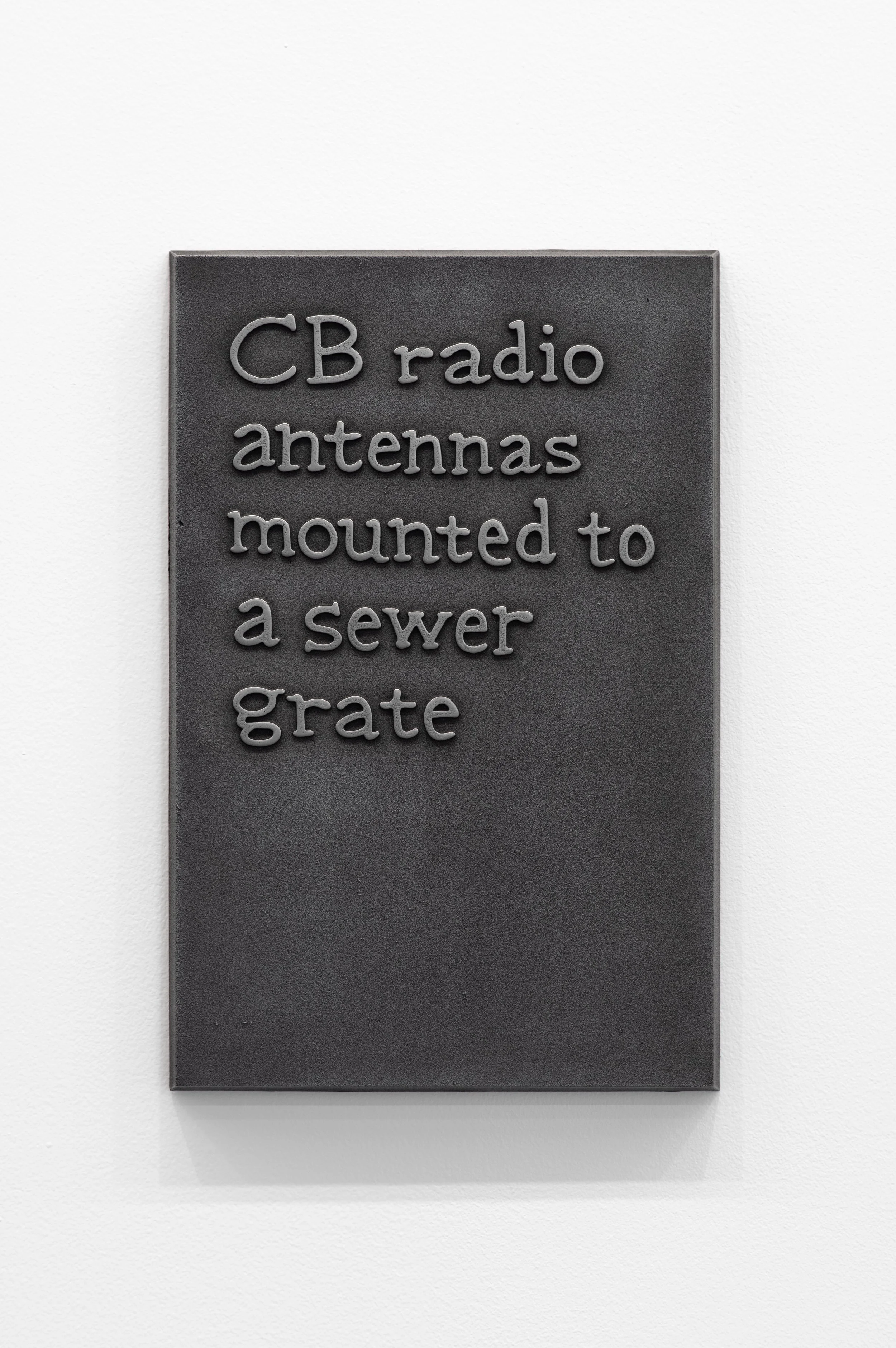 35_CB radio antennas mounted to a sewer grate-1.jpg