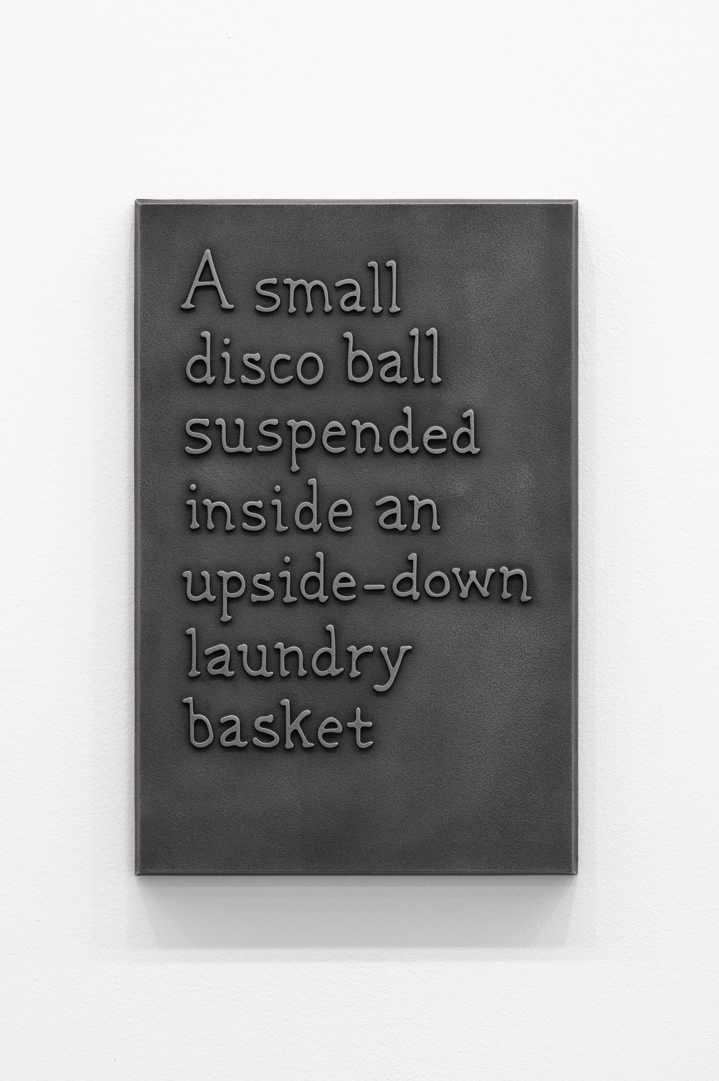 41_A small disco ball suspended inside an upside-down laundry basket-1.jpg