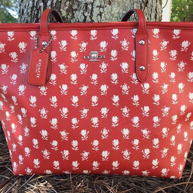 Take time to stop &amp; smell the roses...sweet COACH tote just in at Rococo! #coach #shopsmart #designerbags