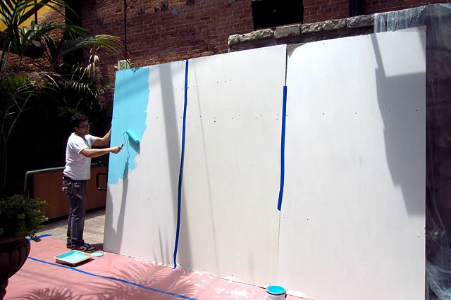  Pablo Moix starts working on his street art piece.​ 
