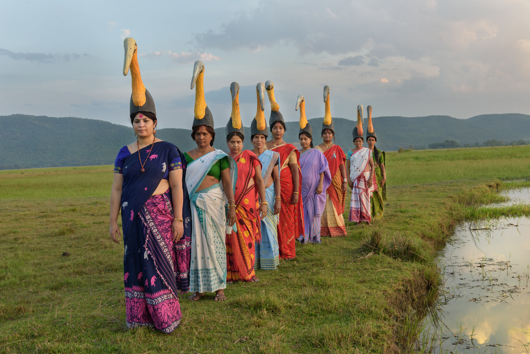  Members of the all-women Hargila Army led by biologist Purnima Barman sport stork masks and pose for a portrait at Dadara village in Assam, India. The group with more than 400 members are fighting to save the endangered Greater Adjutant Stork.  The 