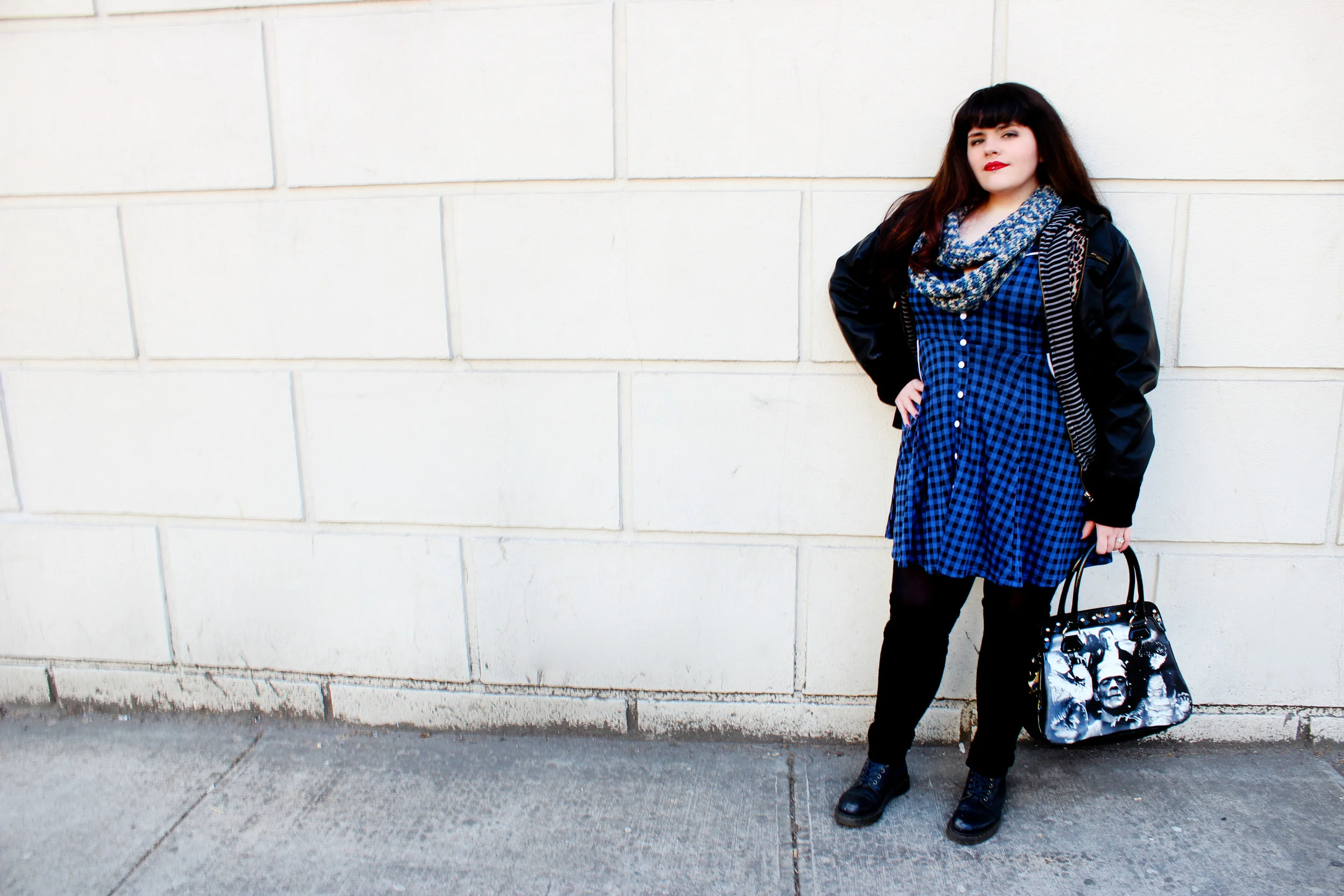 What She's Wearing: Jacket/ Forever21 , Hoddie/???, Scarf/ Hatsscarfsmittensohmy , Bag/ Sourpussclothing.com , Dress/ Sourpussclothing.com , Tights/???, Leg-Warmers/???, Boots/ DrMartens