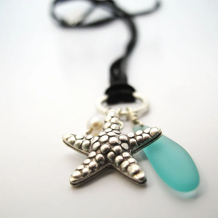 Sterling silver starfish charm necklace
