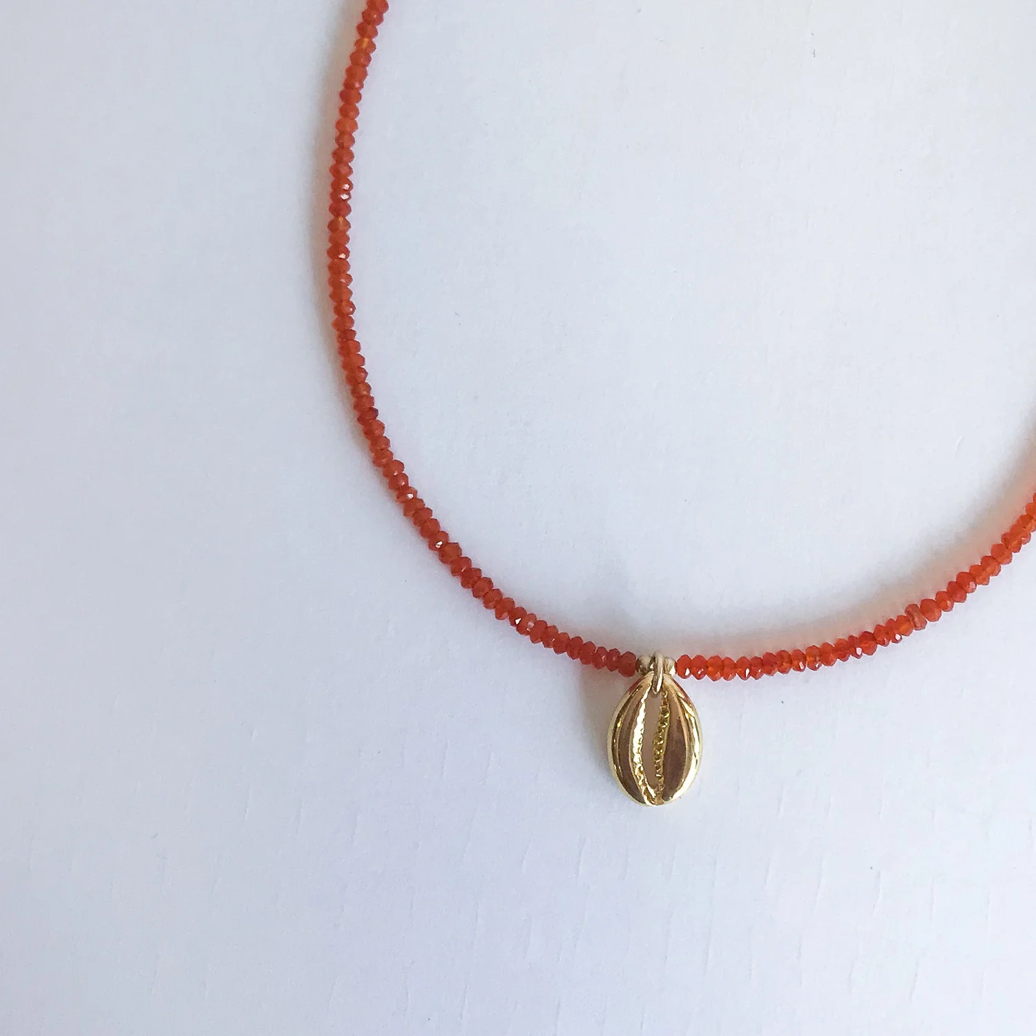simple-carnelian-necklace-shell-medallion-gold.jpg