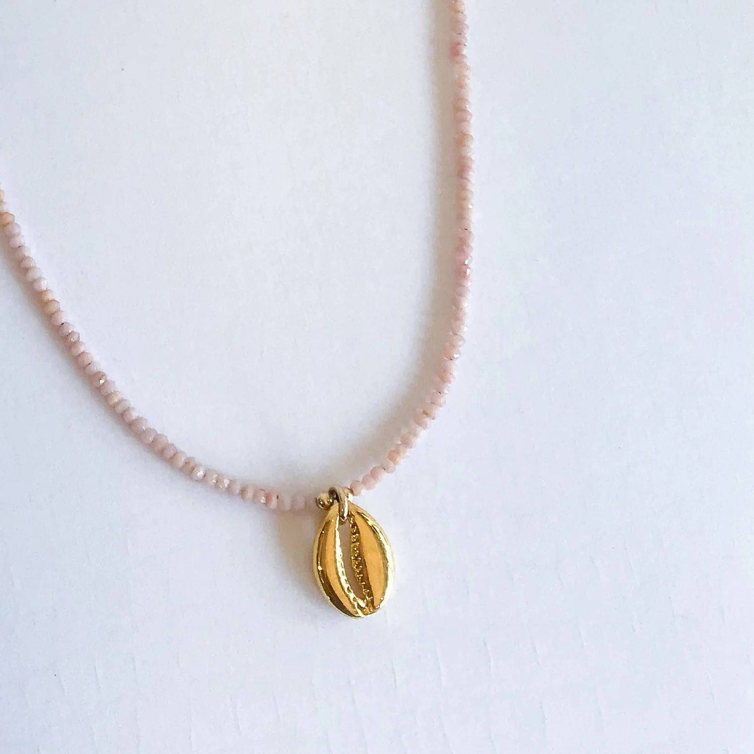 simple-pink-moonstone-necklace-shell-medallion-gold.jpg