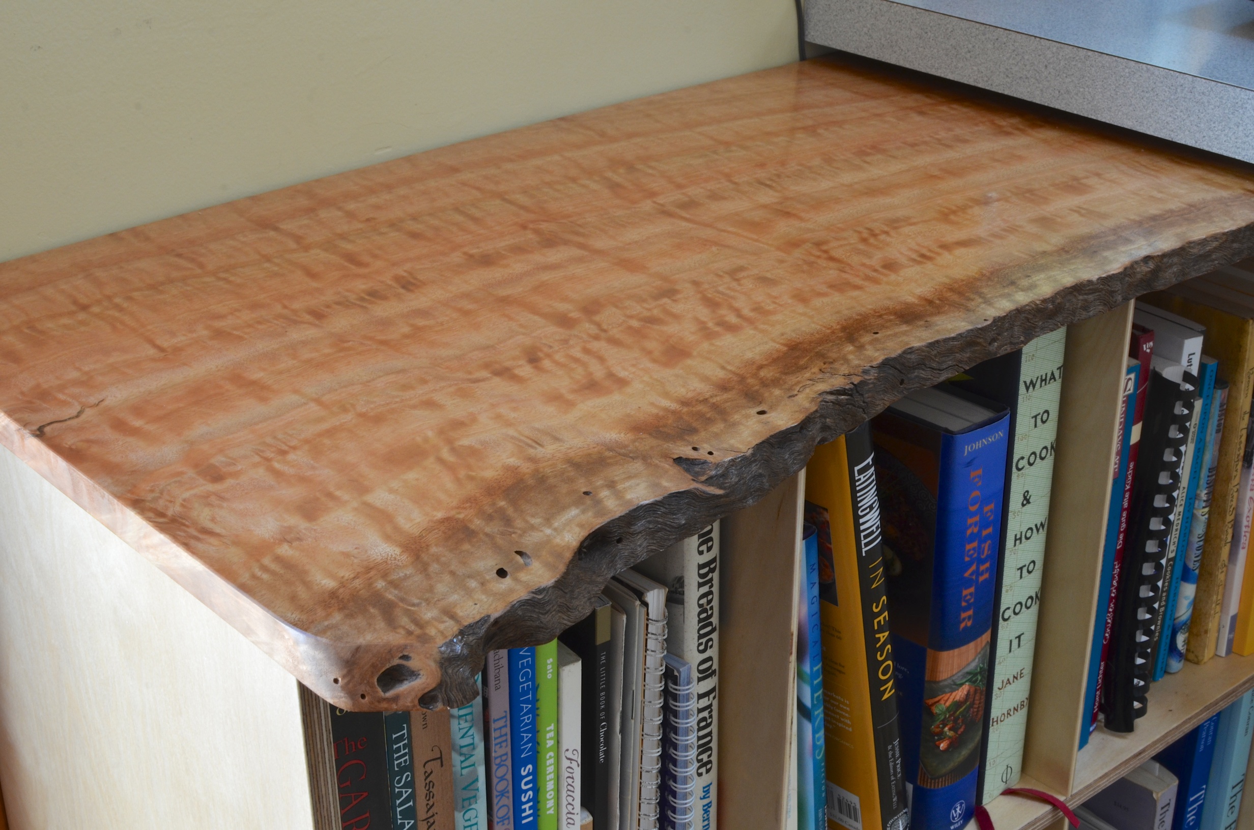 Cookbook Shelf. A piece of figured eucalyptus and birch fin-ply made a nice home for some formerly free ranging cookbooks.