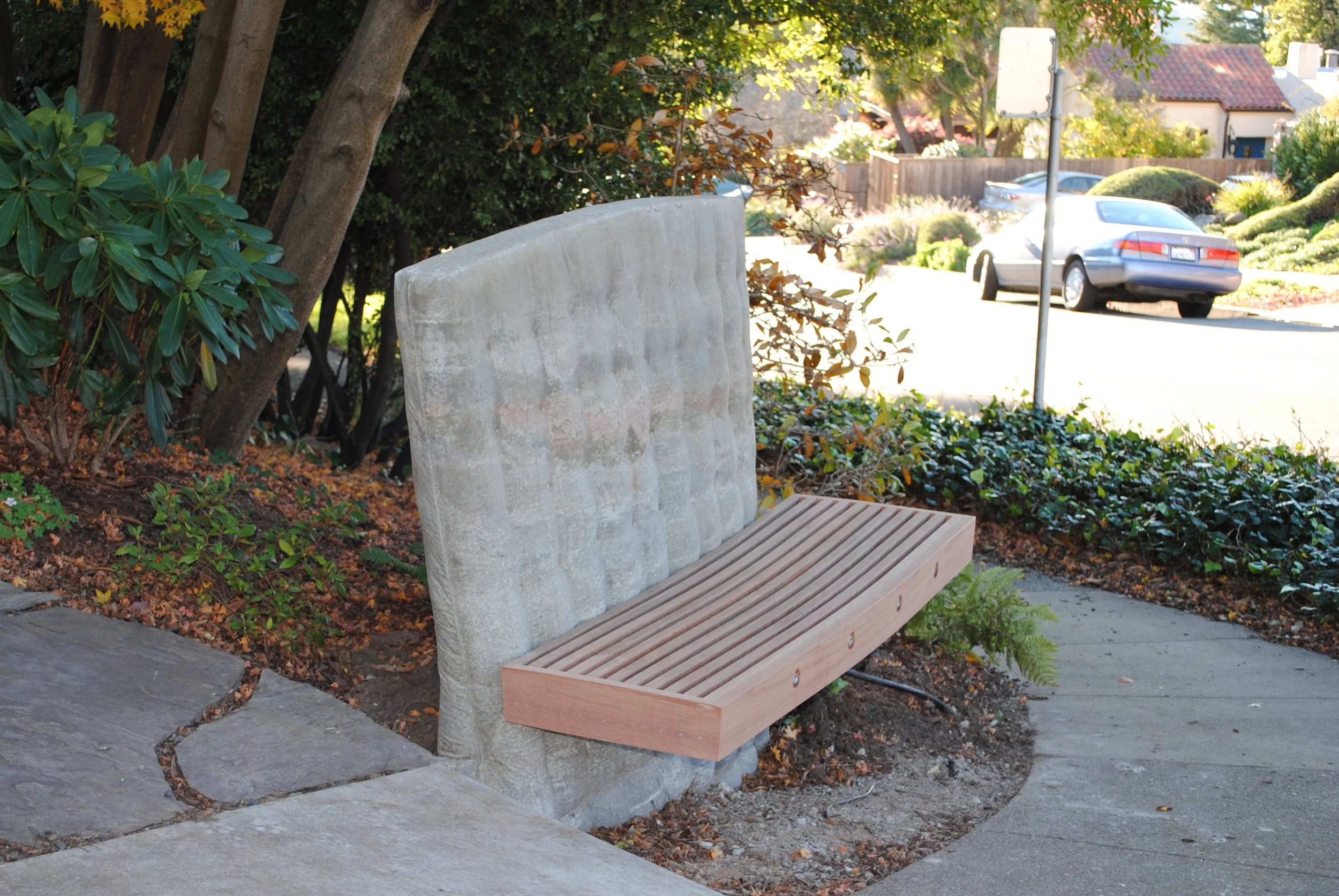  This monolithic concrete bench with hardwood seat was&nbsp;cast in place at the top of a steep hill. &nbsp;It offers weary travelers a welcome rest and is surprisingly comfortable, even if you were expecting a mattress, not concrete.&nbsp; 