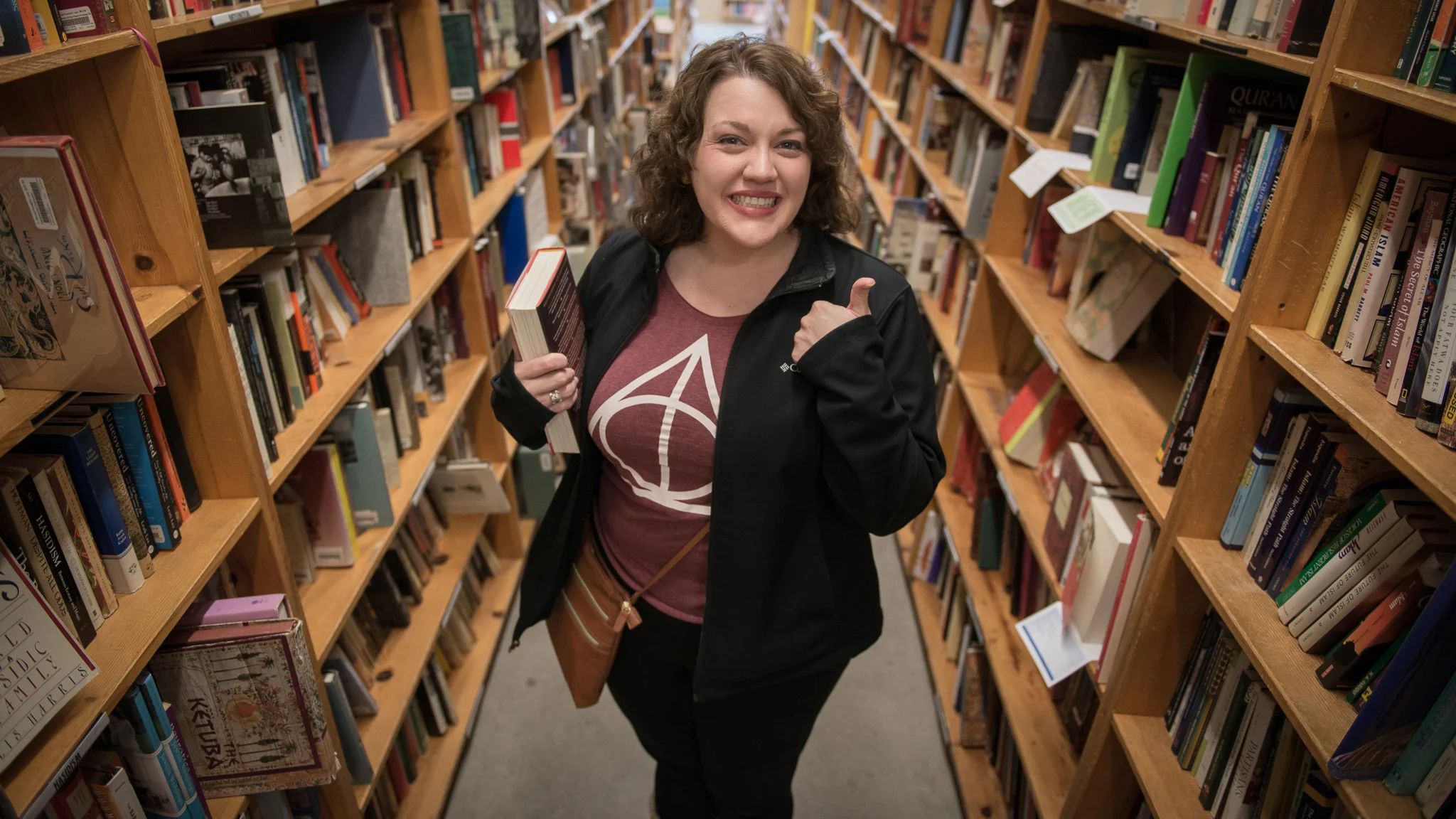 Emily worshipping at the high cathedral of Powell's City of Books