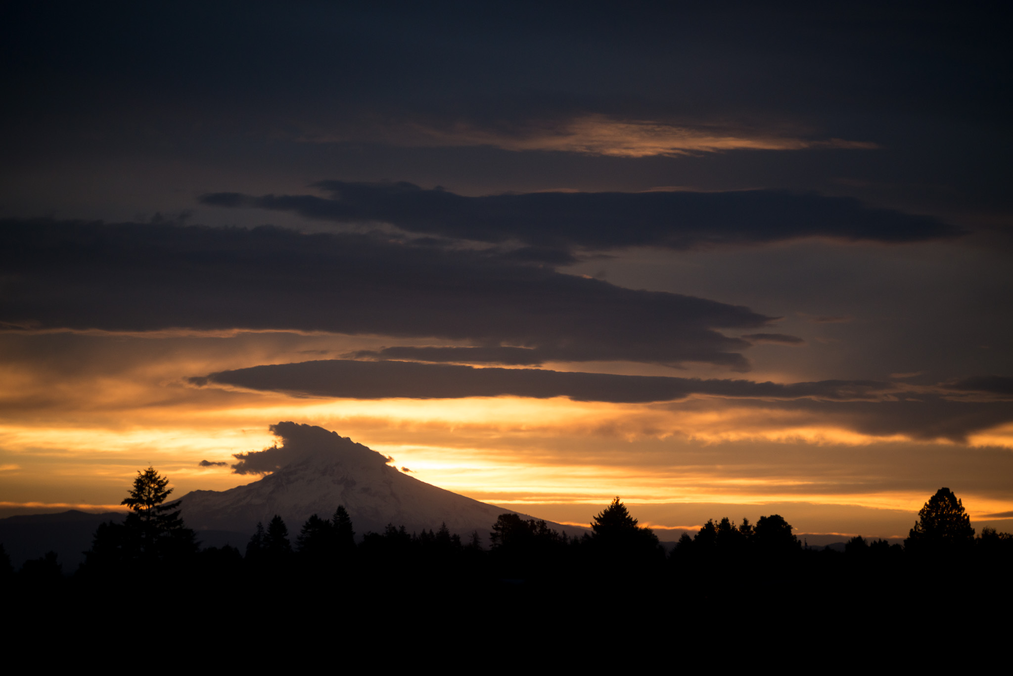 This is Mount Hood, seen at sunrise, from a field two blocks from our apartment. How cool is that?