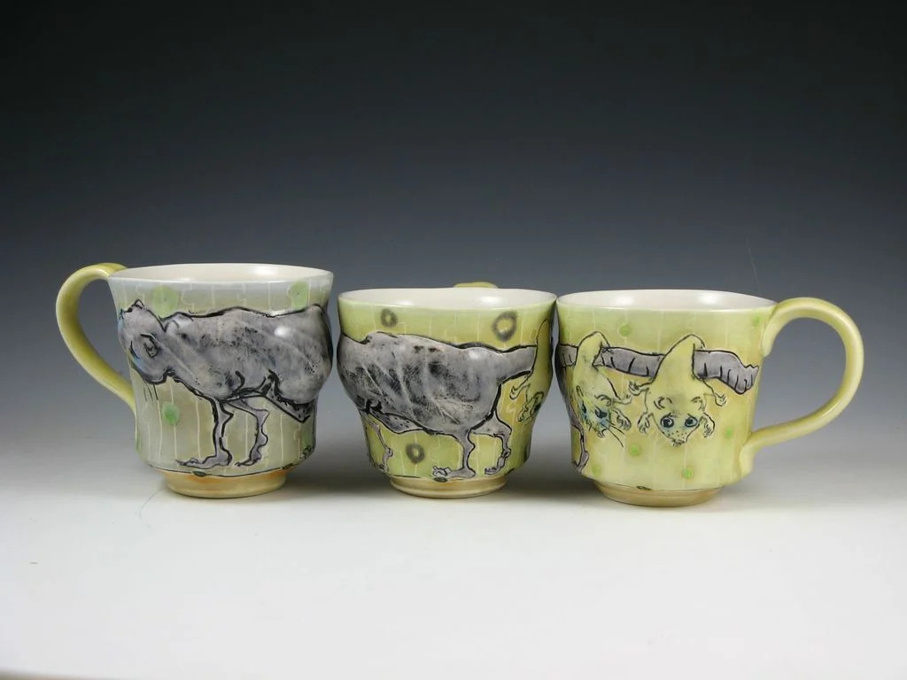 Possum and Babies, three porcelain mugs, fired to cone 6, with inlaid decoration, terra sigillata and glaze, by Ellen Mulligan