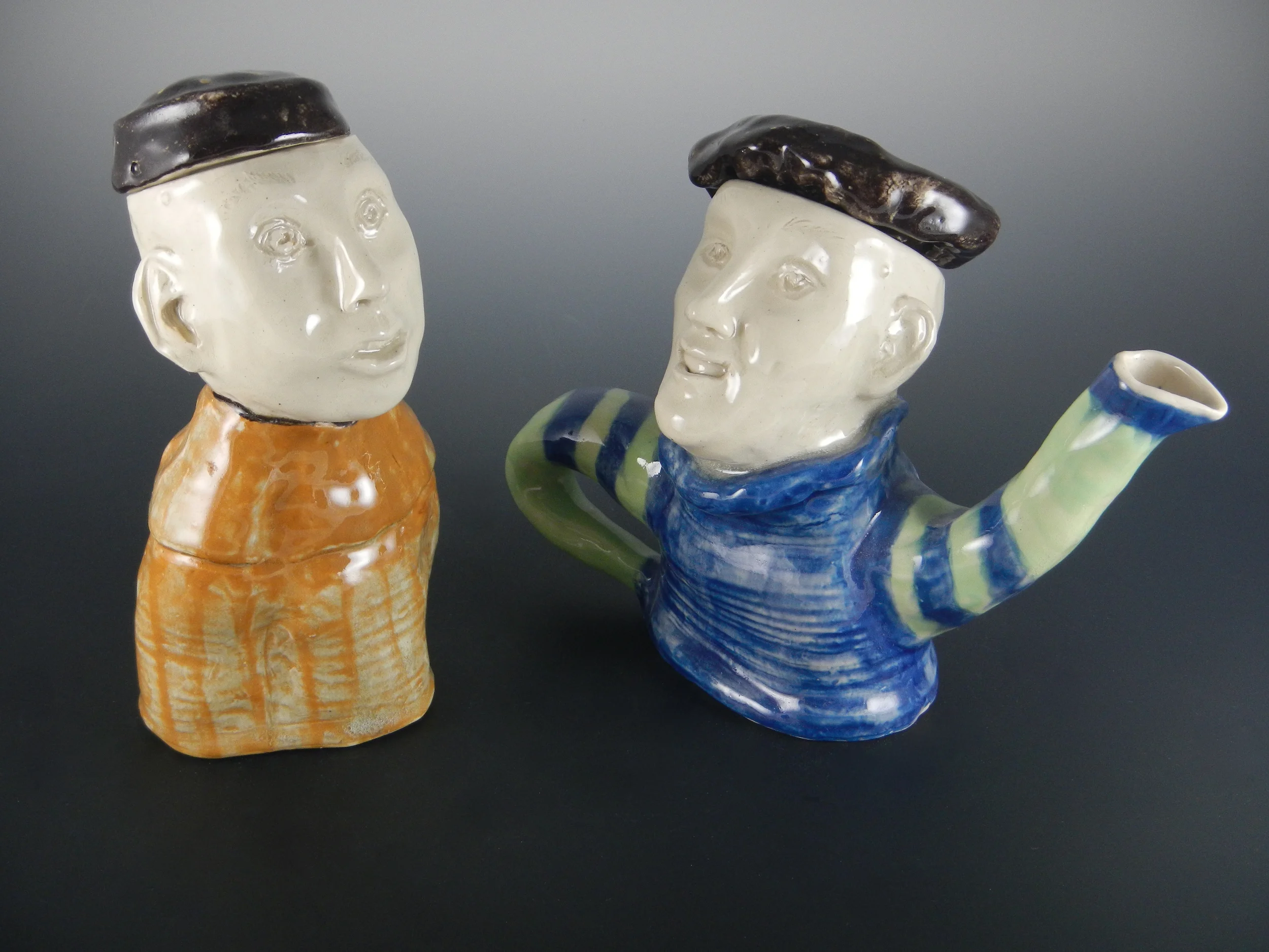 ("Marketplace Tea", 2000. The fellow who is not a teapot is a sugar bowl. They used to have a goat creamer, but it broke... By Mimi Stadler Pottery. Photo by the artist, 2014.)