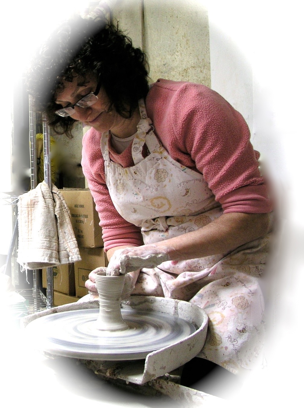 (Before the studio reno, on my trusty Lockerbie kickwheel, ca. 2011)