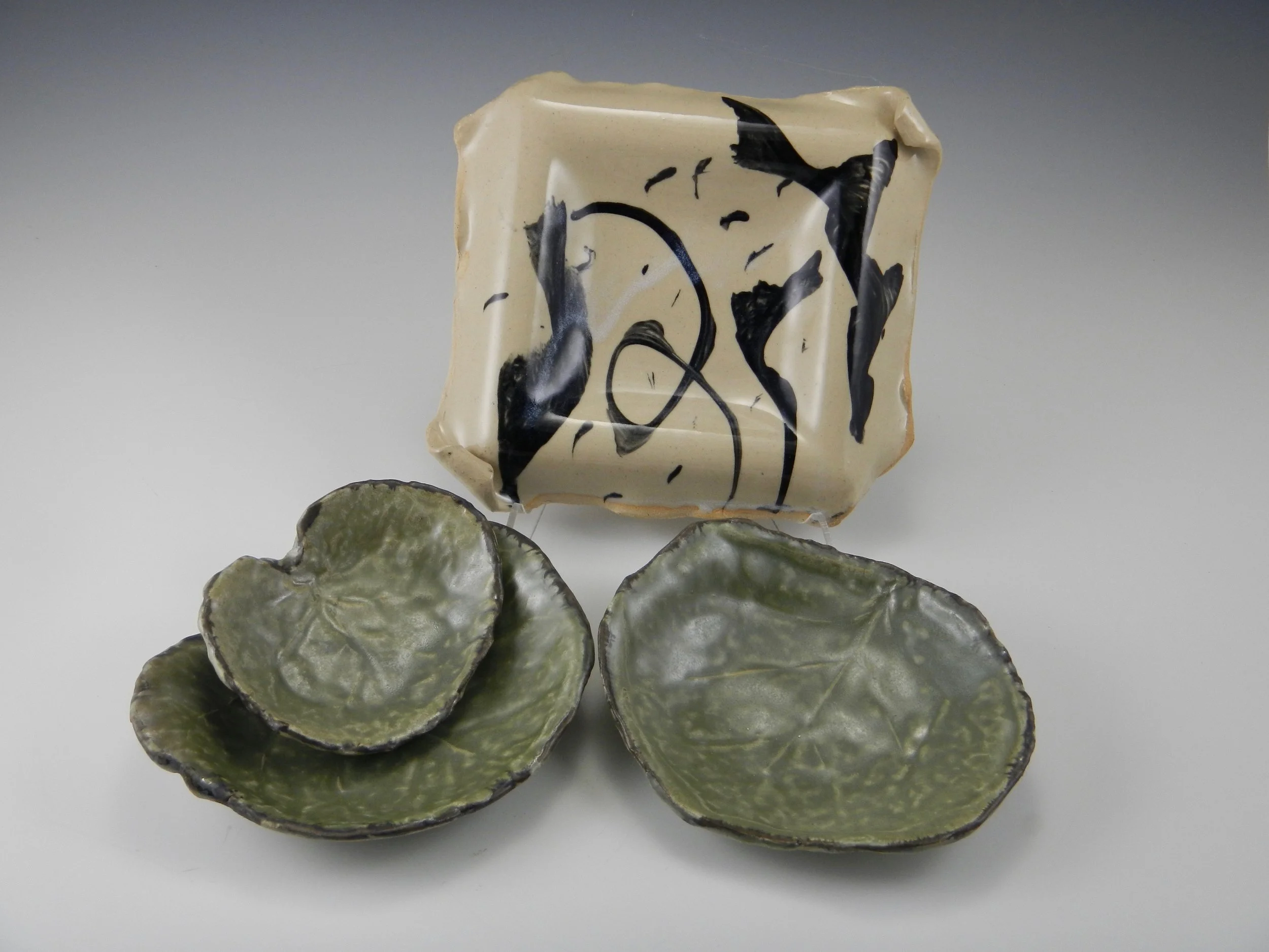(Leaf dishes, and square plate made over a drape-mold)