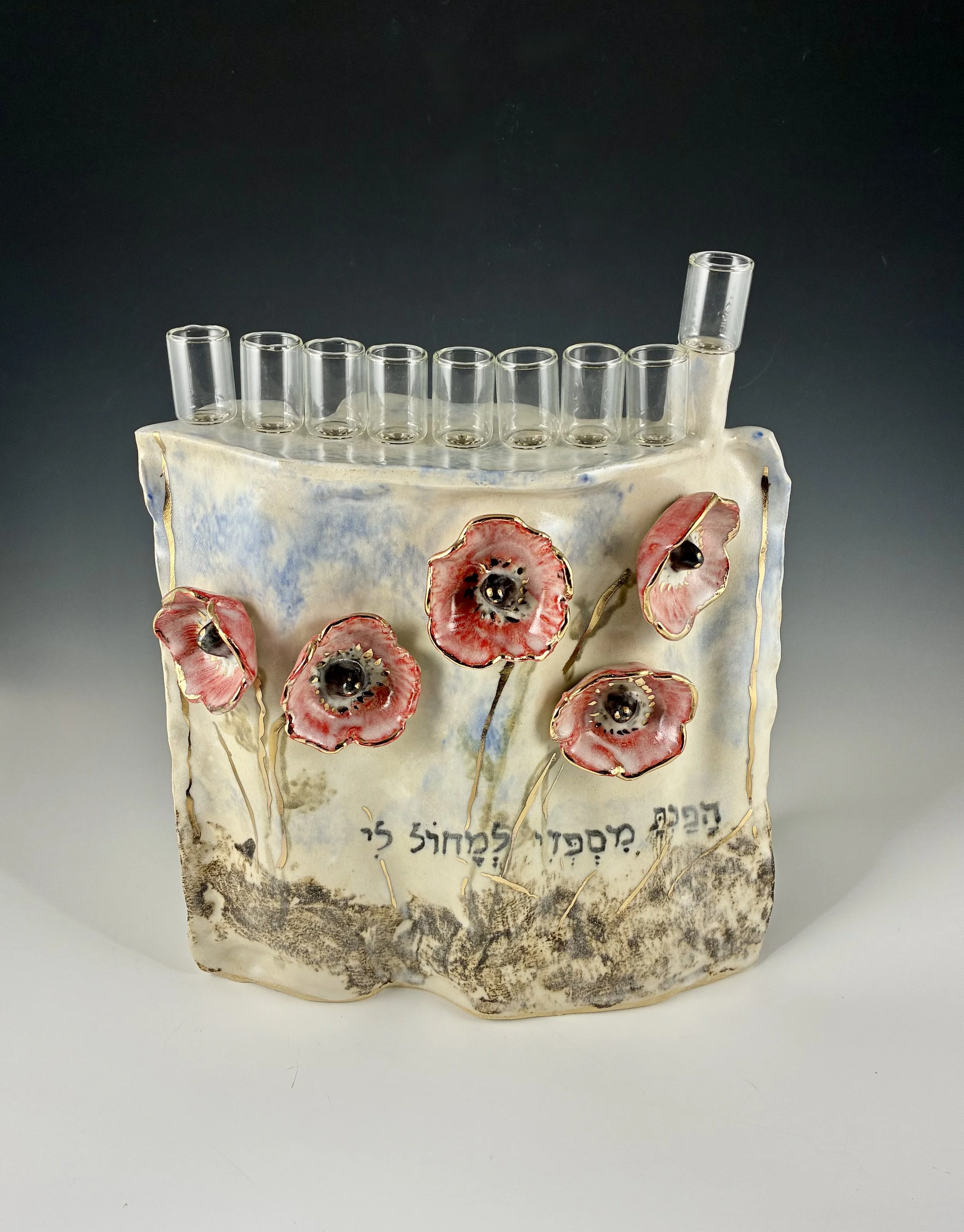 Chanukah menorah with raised red flowers and glass cups