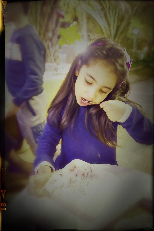 Kids will usually act more naturally quicker as they have not yet built up self protective mechanisms. A nice, simple moment is captured as Reema finishes off her dessert. The image represents innocence of children and their trusting nature. A common trait among most cultures Muslim and Non-Muslim.