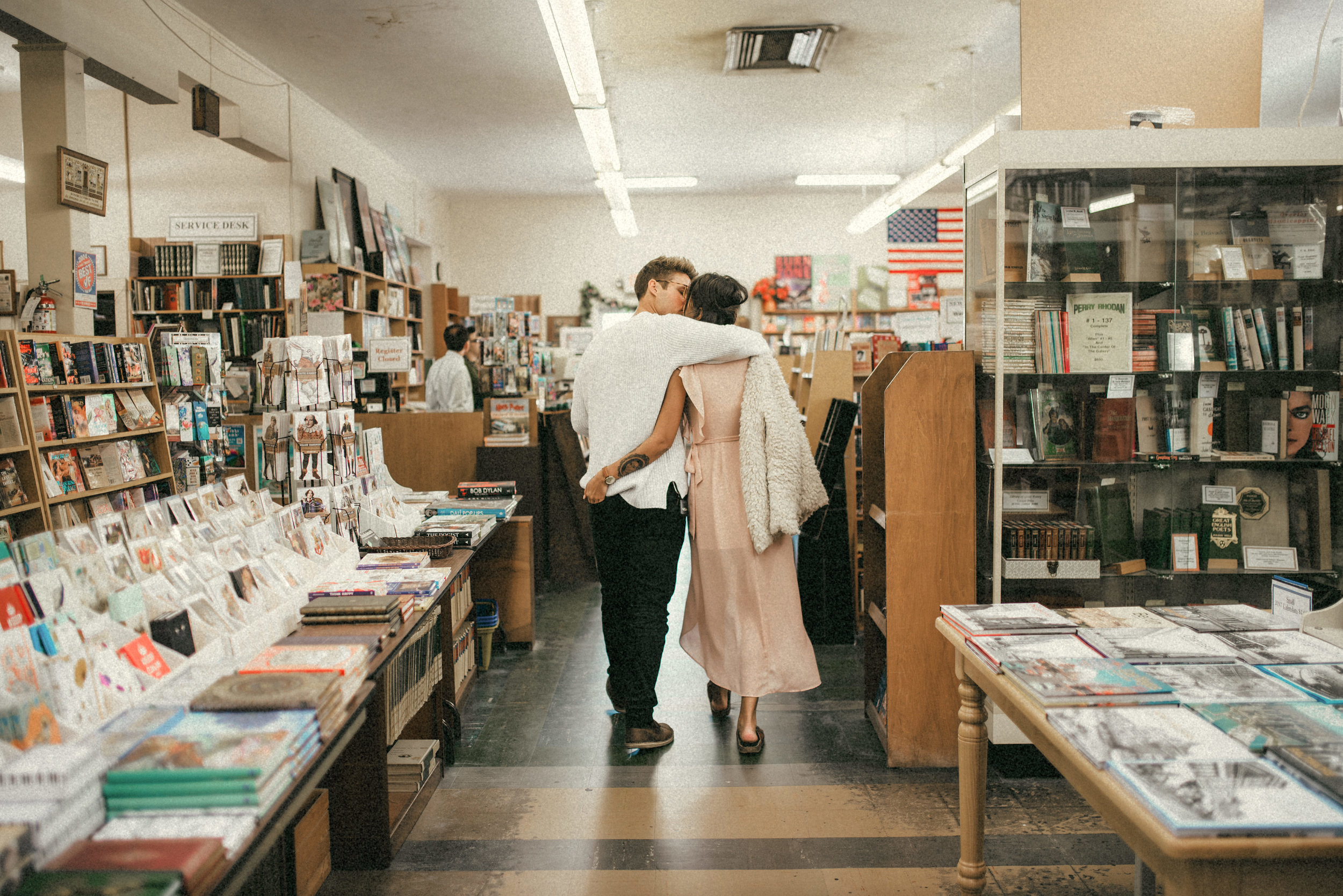  Hillary & Brandon walking out of bookstore - couple portraits - st pete florida - naples florida wedding photographer - tampa wedding photographer 