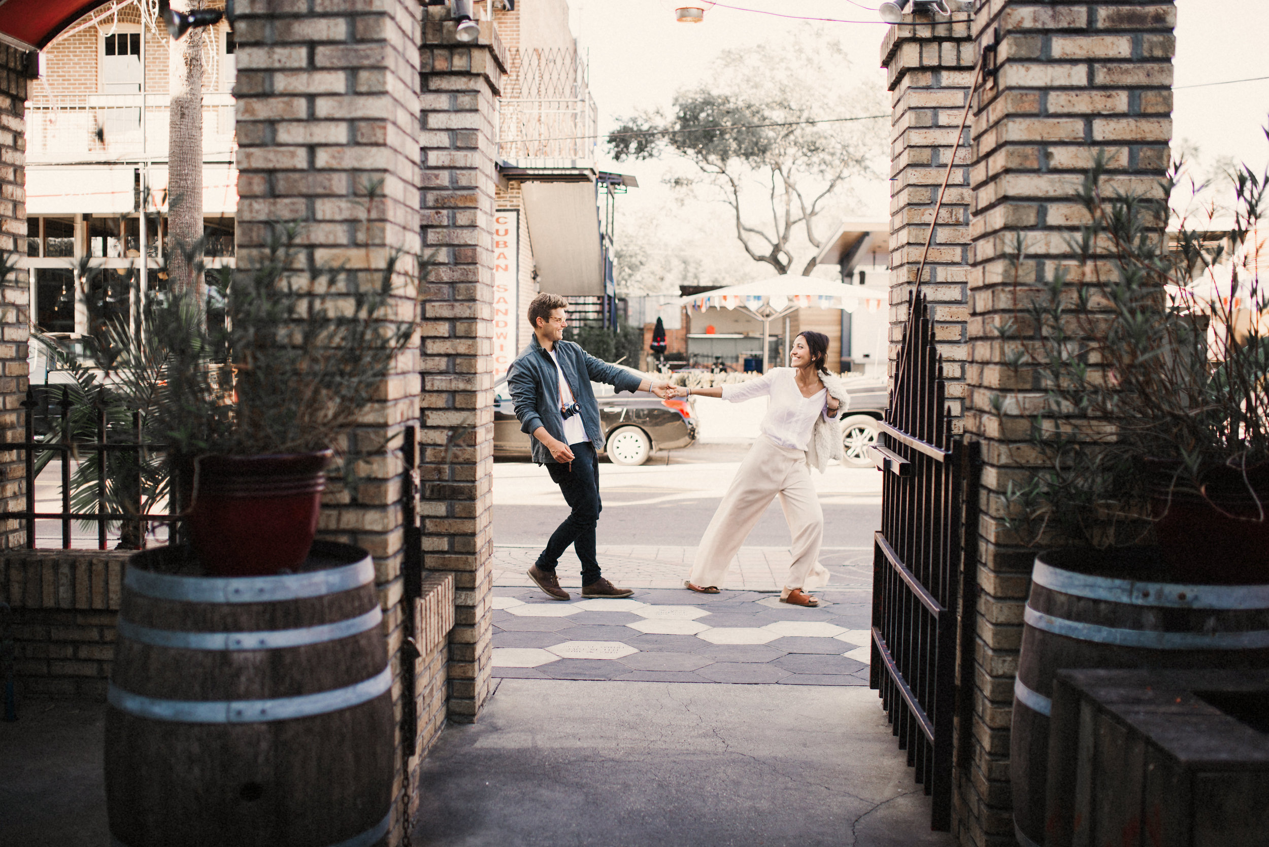  Brandon & Hillary running in Ybor Tampa Florida - couple portraits - st pete florida - naples florida wedding photographer - tampa wedding photographer 