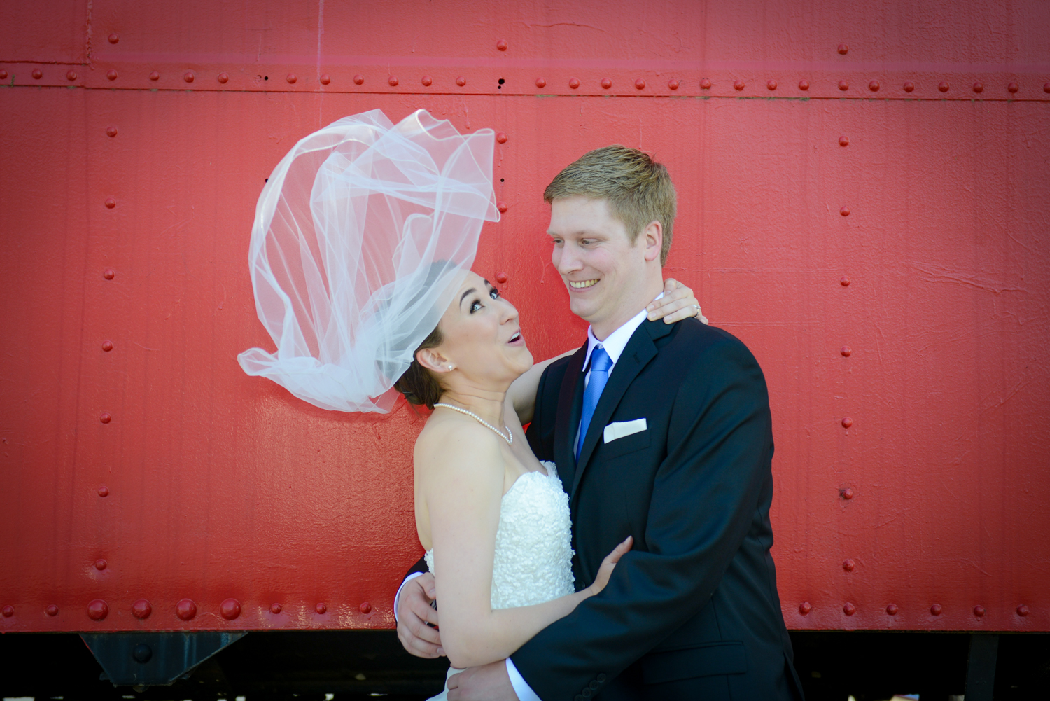 During Ashleigh and Florian's wedding portraits a sudden burst of wind took us all by surprise.