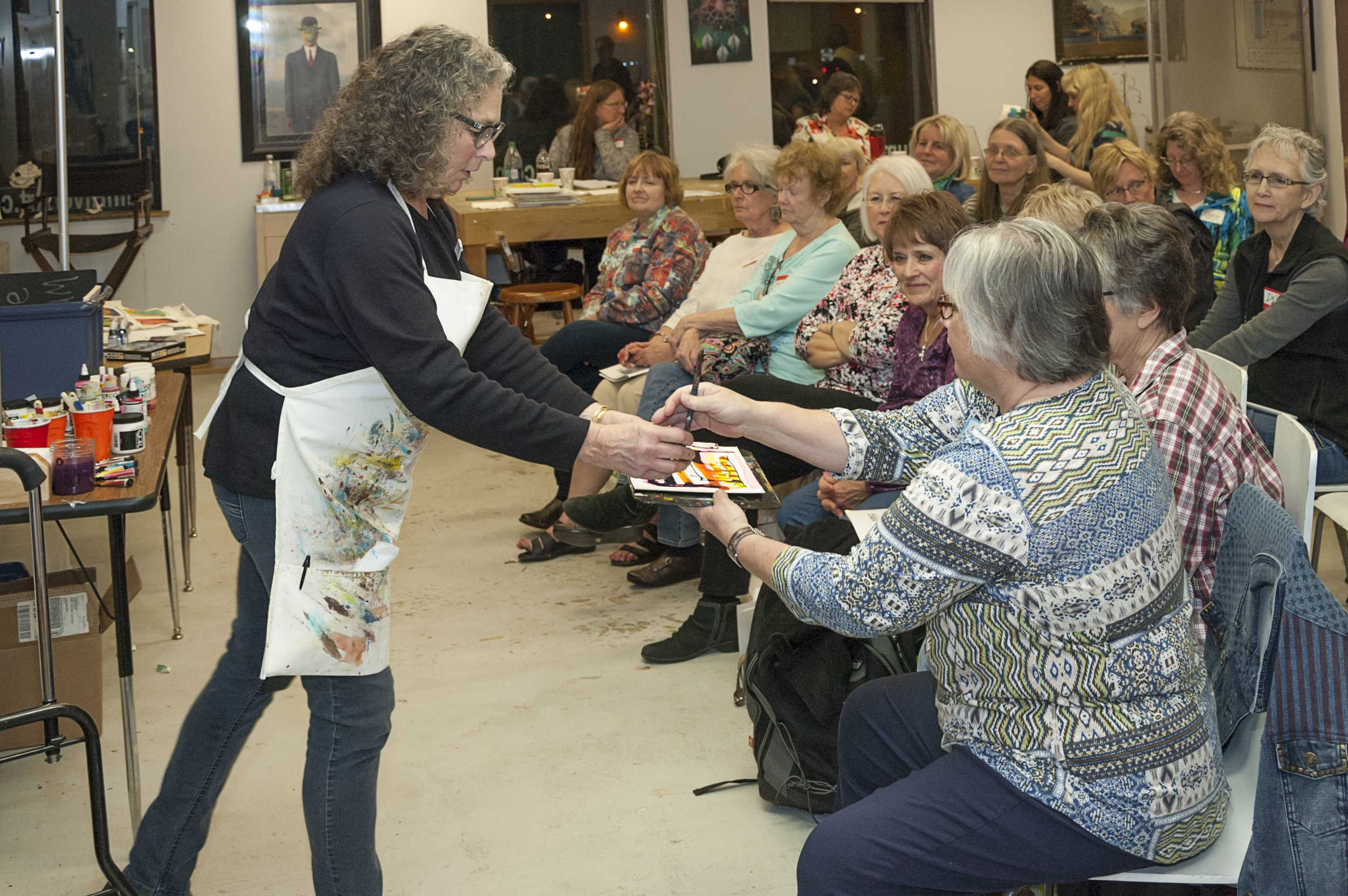 Bonnie Cutts from Golden Acrylics shows members new products and gives tips on using their paints.