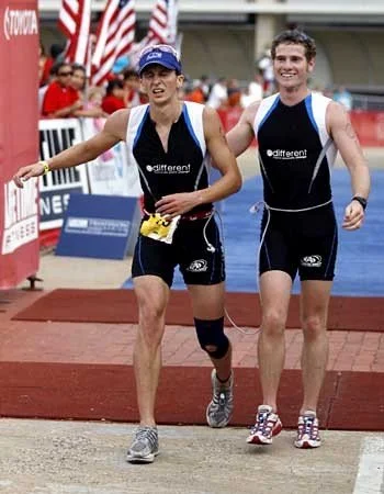 At the Lifetime Fitness Dallas Open Triathlon I met a major benchmark in triathlon and fulfilled one of my goals in breaking down barriers for people with disabilities. Guided by star triathlete Ben Collins, I broke the 2hr mark in an Olympic distance triathlon, crossing the line in 1:59:36. This marked the first time any paratriathlete had ever broken the 2hr barrier at this distance. I have since went under 2hr several other times but this was an amazing day even though I look like I might die in the photo. :)