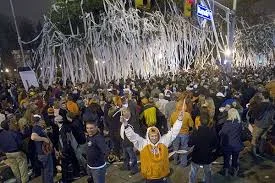 An Auburn tradition to roll the tree at Toomers Corner after a big victory