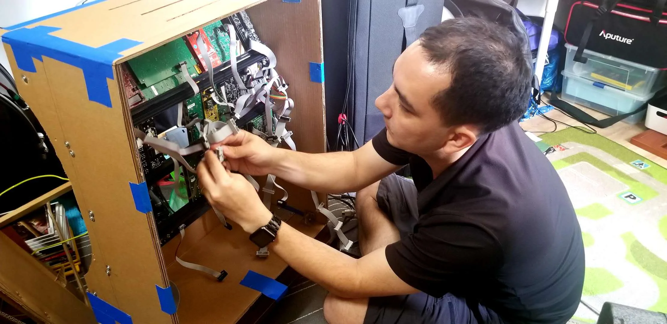 Theodore Kaye and his hand-made synthesiser “Wonder Box” in his home studio
