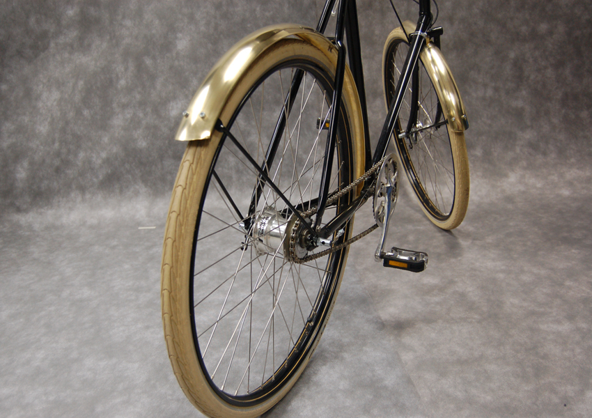 Brass mudguards by Thomas Slack