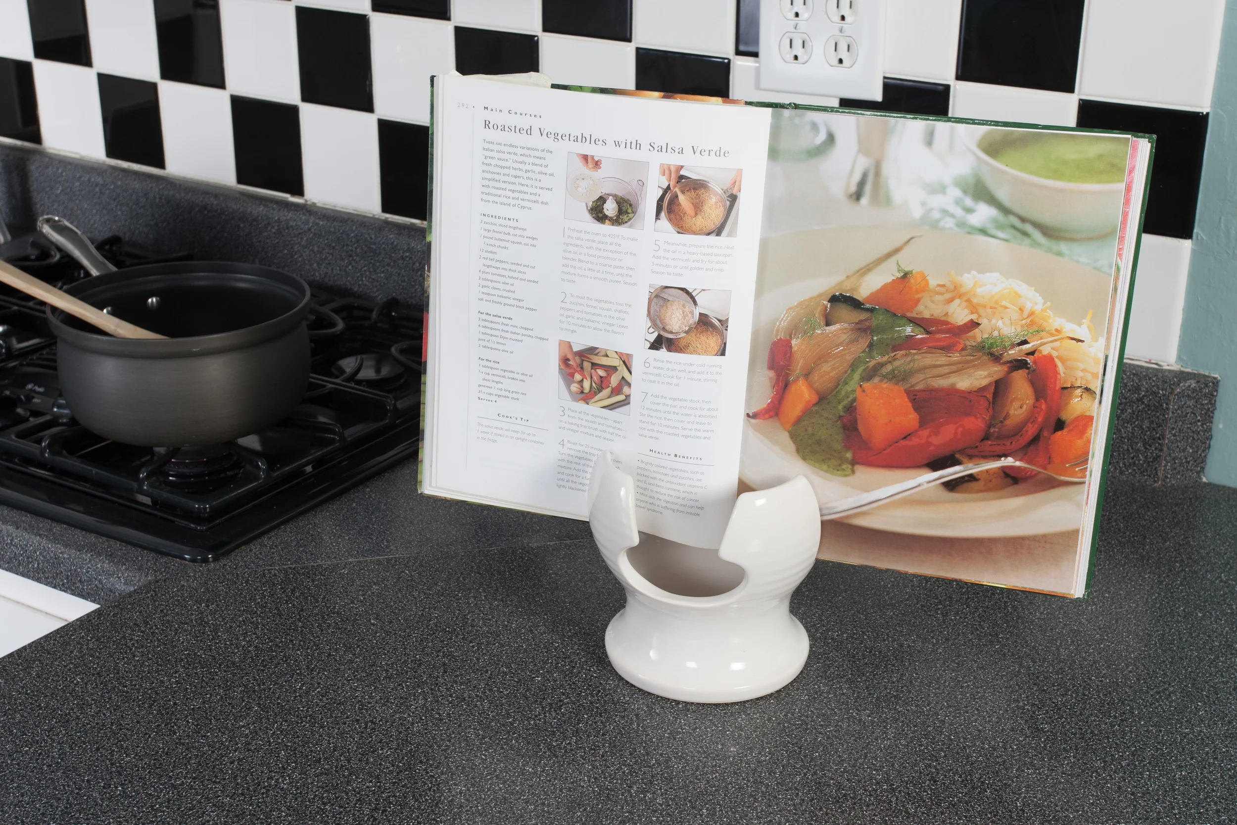 Keeps your cookbook out of the mess.