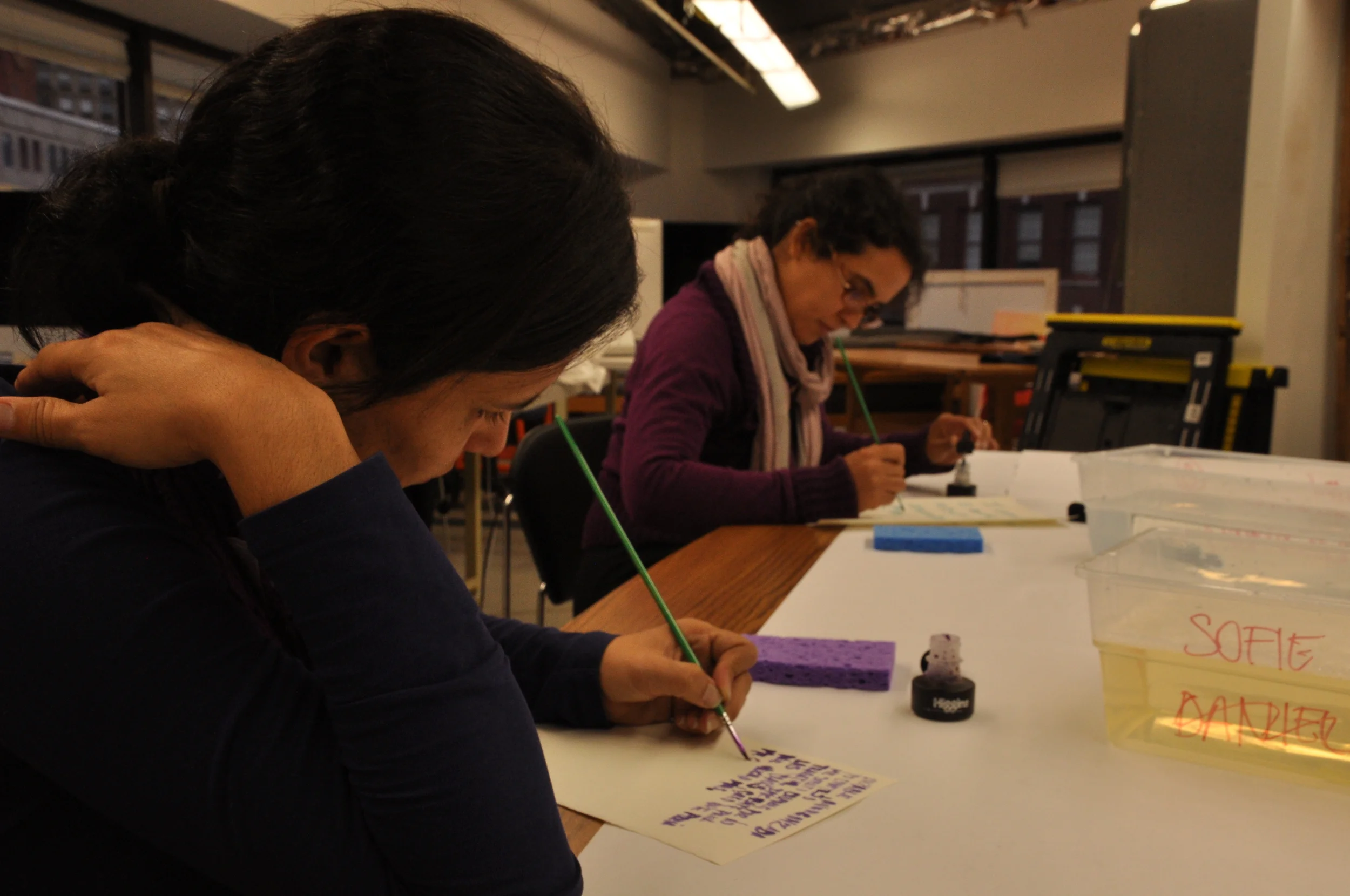  Each person gets a piece of paper, water soluble ink and a sponge. For 20 minutes, by using the water soluble ink, they write their experiences that makes them feel guilty, dirty or embarrassed to share with others.&nbsp; 