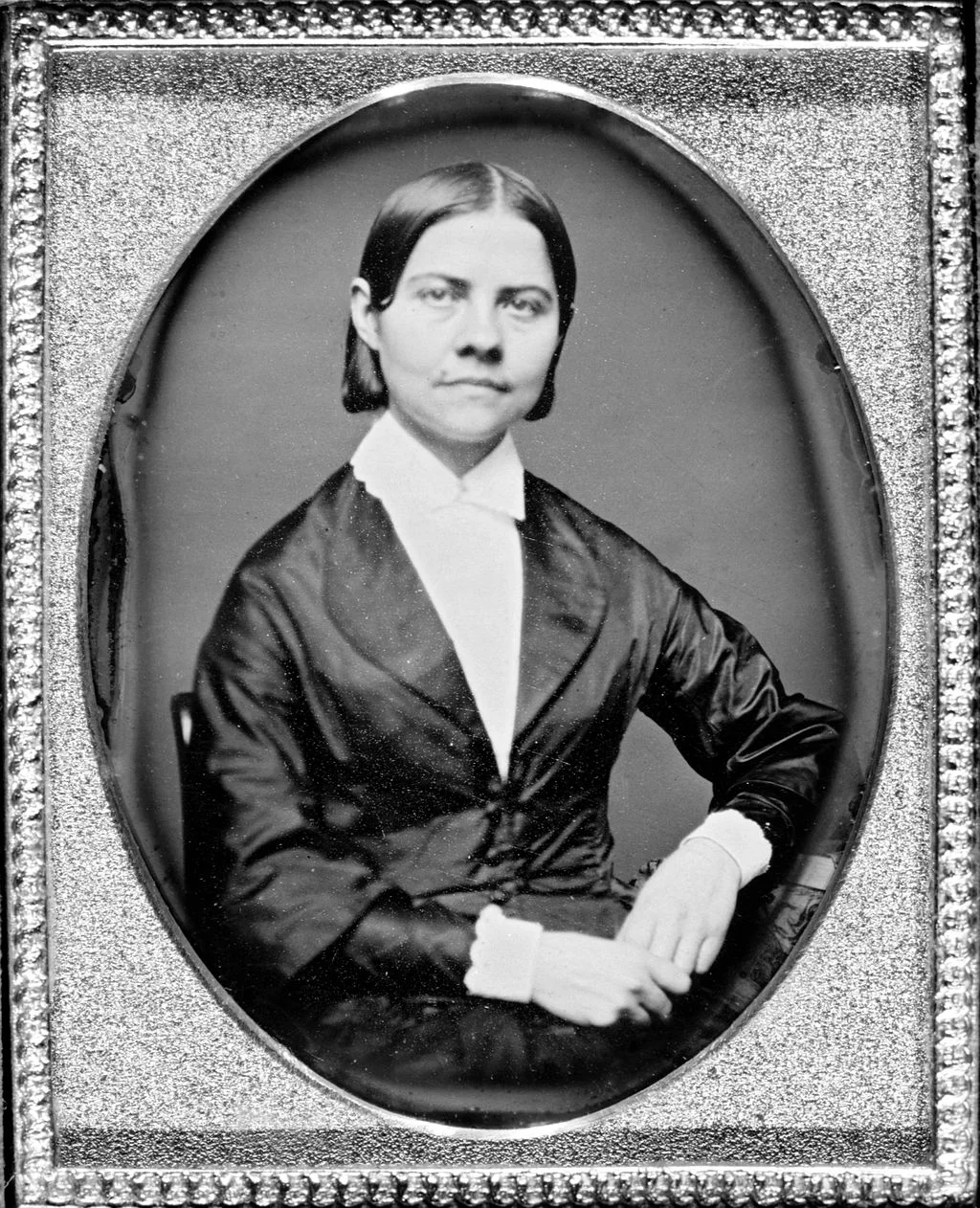 Lucy Stone (1818-1893), prominent women’s suffragist and abolitionist. She became the first woman from Massachusetts to earn a college degree and was a public advocate on behalf of women’s rights and anti-slavery initiatives. Stone pursued her advocacy despite often hostile laws of the time preventing women from speaking in public.