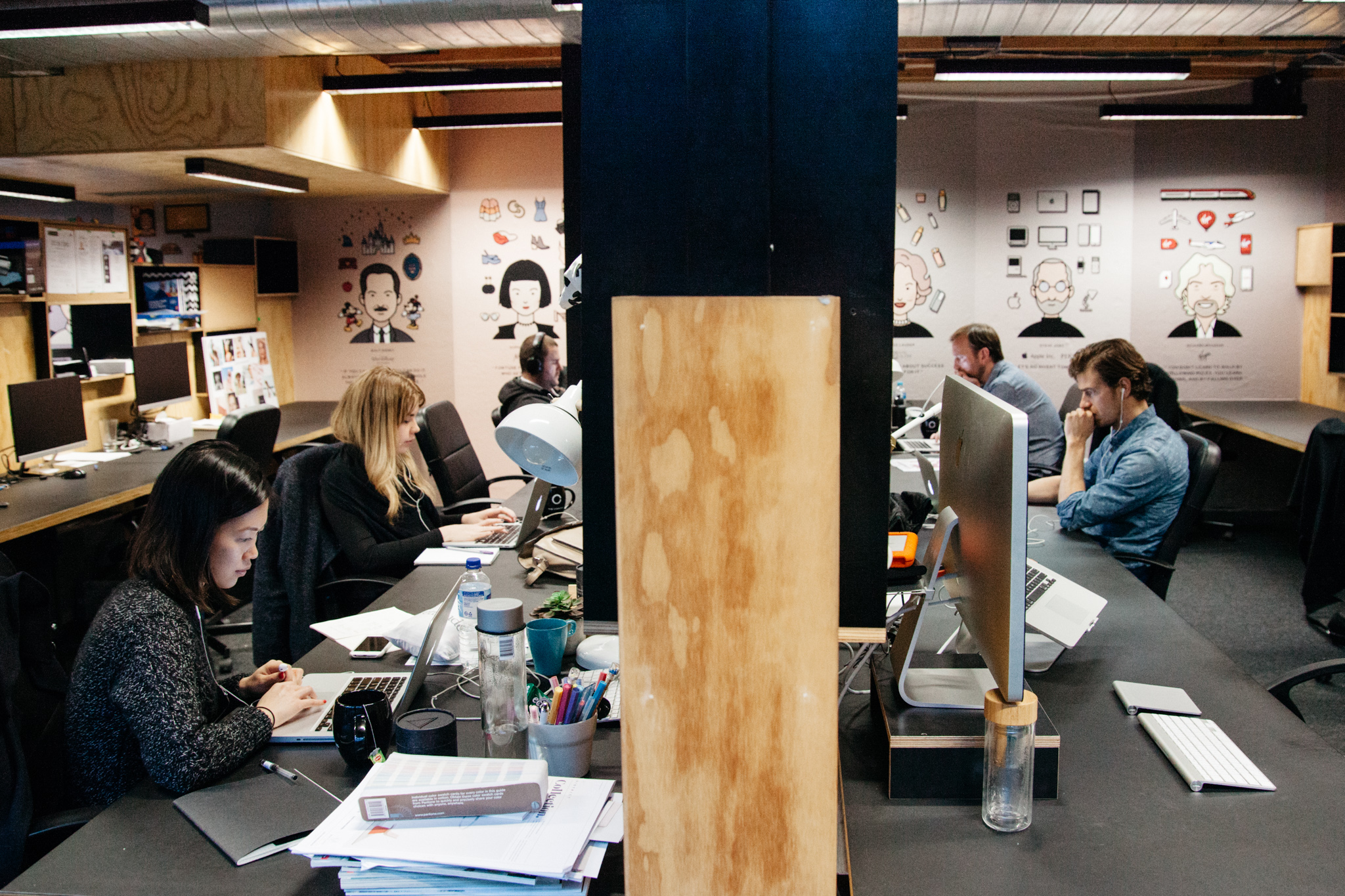 Residents working within a team office at The Commons  (Image courtesy Cliff Ho)