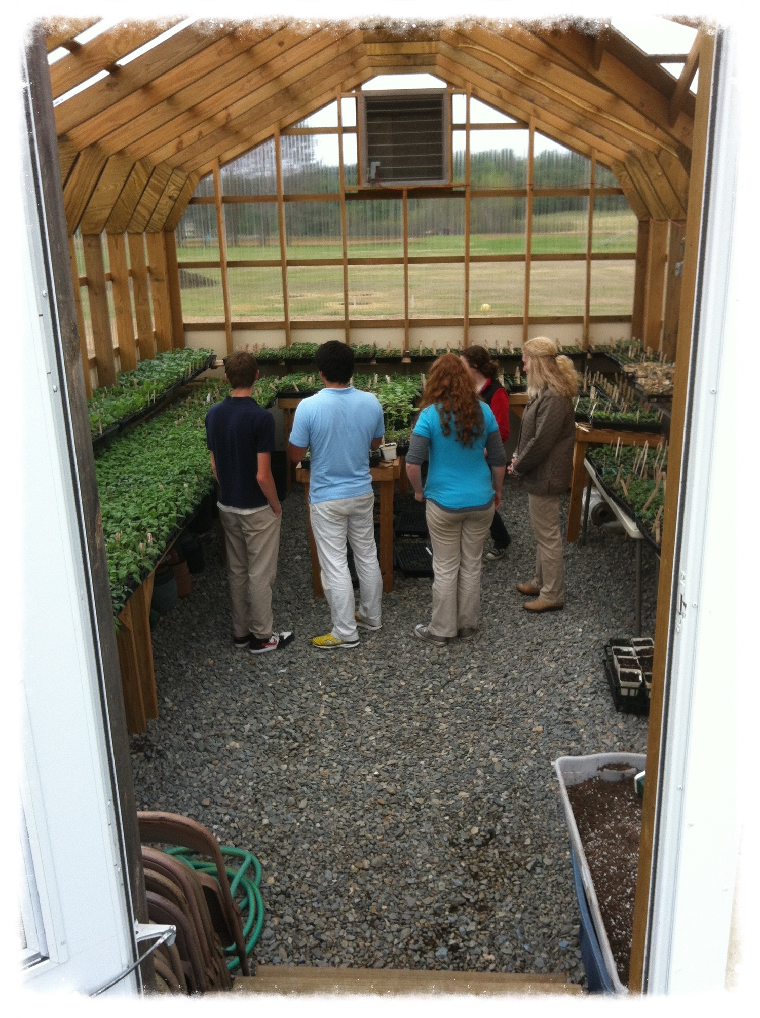 Students at Riverview Memorial School students showing off their greenhouse while on our tour.