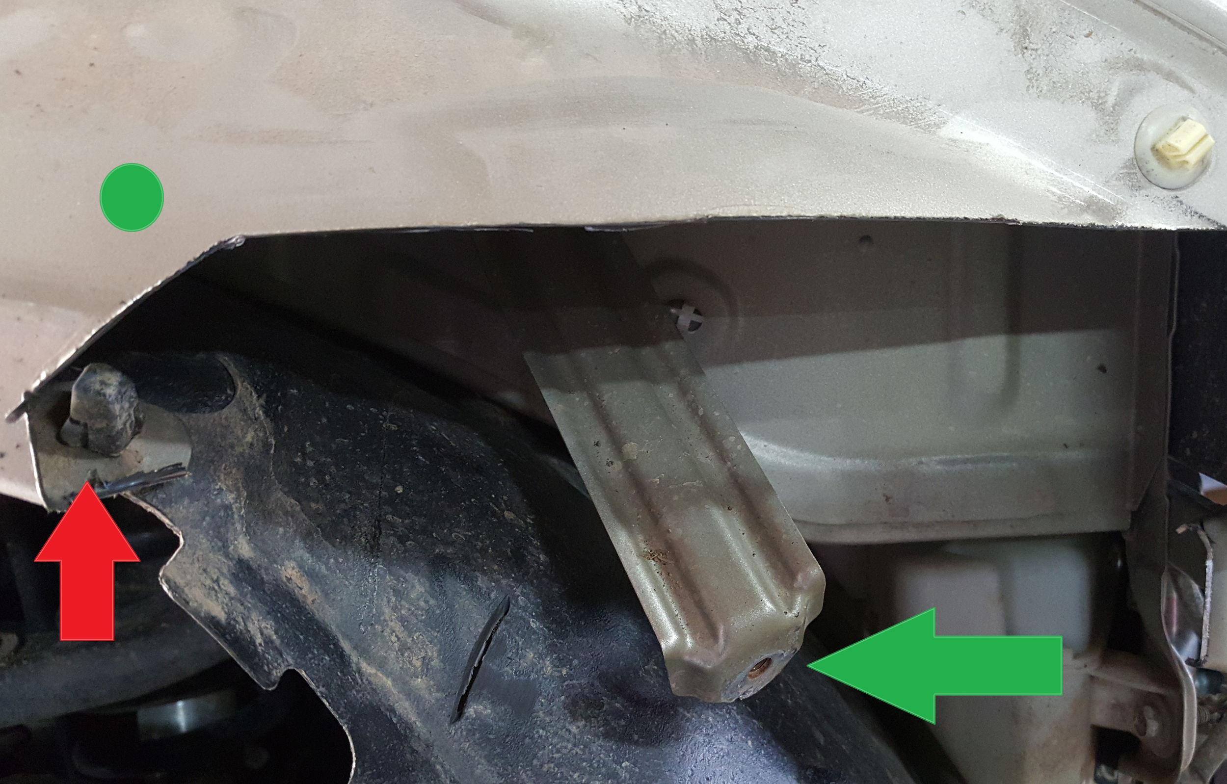 Red Arrow: Keep that tab if at all possible. Green Arrow: That bracket would benefit in being relocated. With some ingenuity and tweaking, I was able to drill a hole and affix it to the fender further up (near the green circle). 