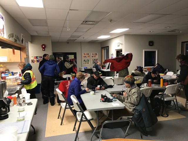 A quiet, dark space is saved in the back of this room for handlers and volunteers to catch a nap while waiting for mushers (thanks Pelly Crossing!)