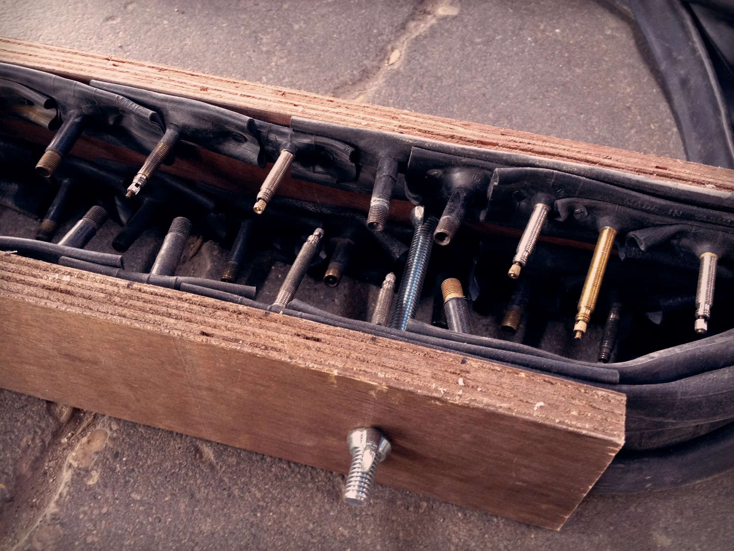 I bound each plank pair together with long screws and wing nuts.