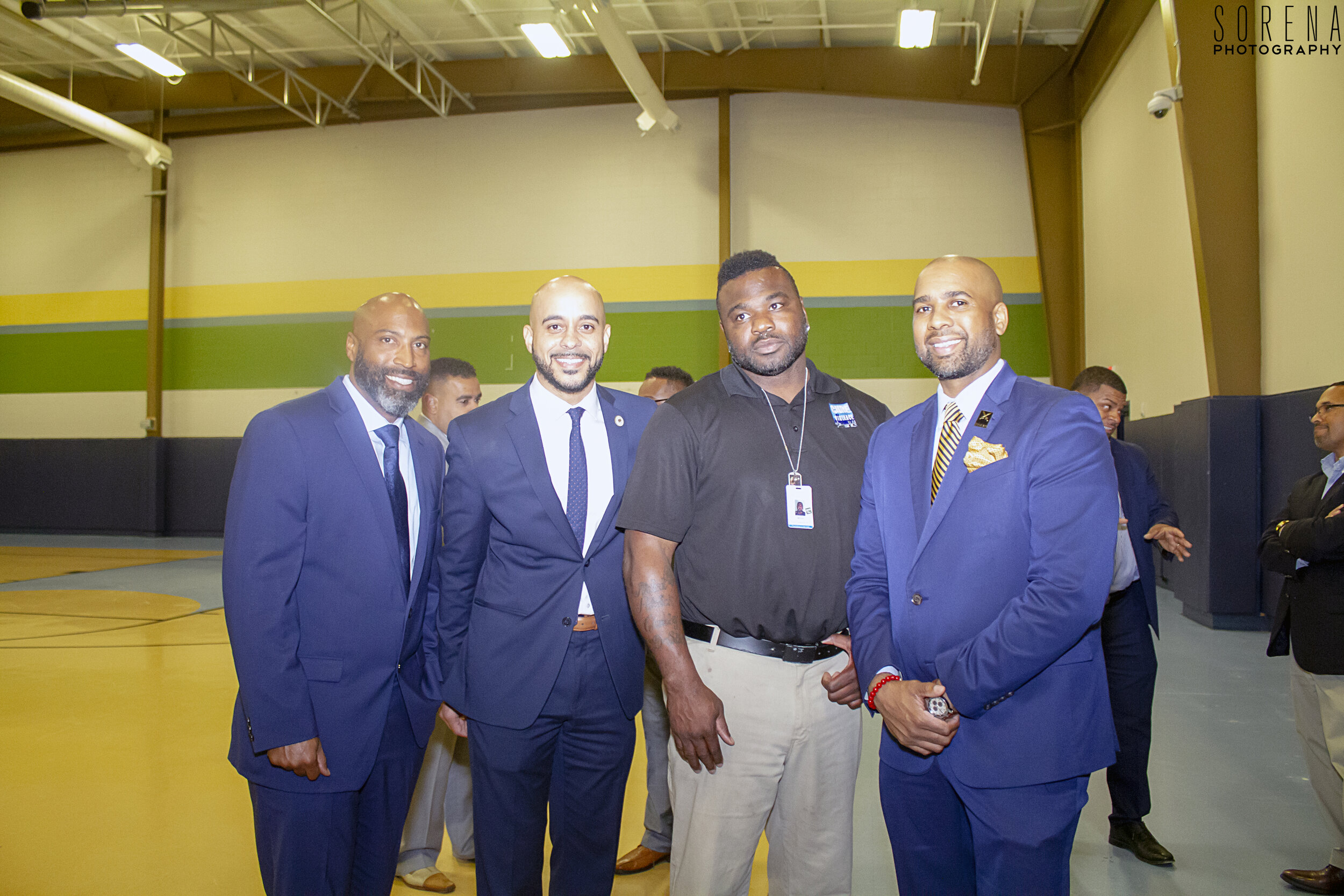 Patrick Young, Founder of SHARP MEN, stands proudly with Royce Duplessis and others at the SHARP MEN event