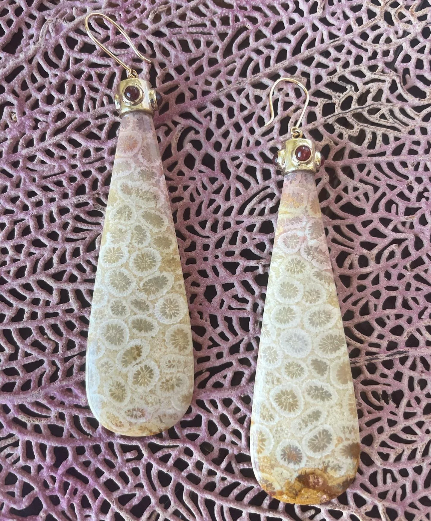 Keeping with the big dangly coral theme - these are custom cut Indonesian fossilized coral with ruby cabochons set in 14kt yellow gold.  The stones are wide but very thin so they are quite comfortable...just don&rsquo;t try to run while wearing them.
