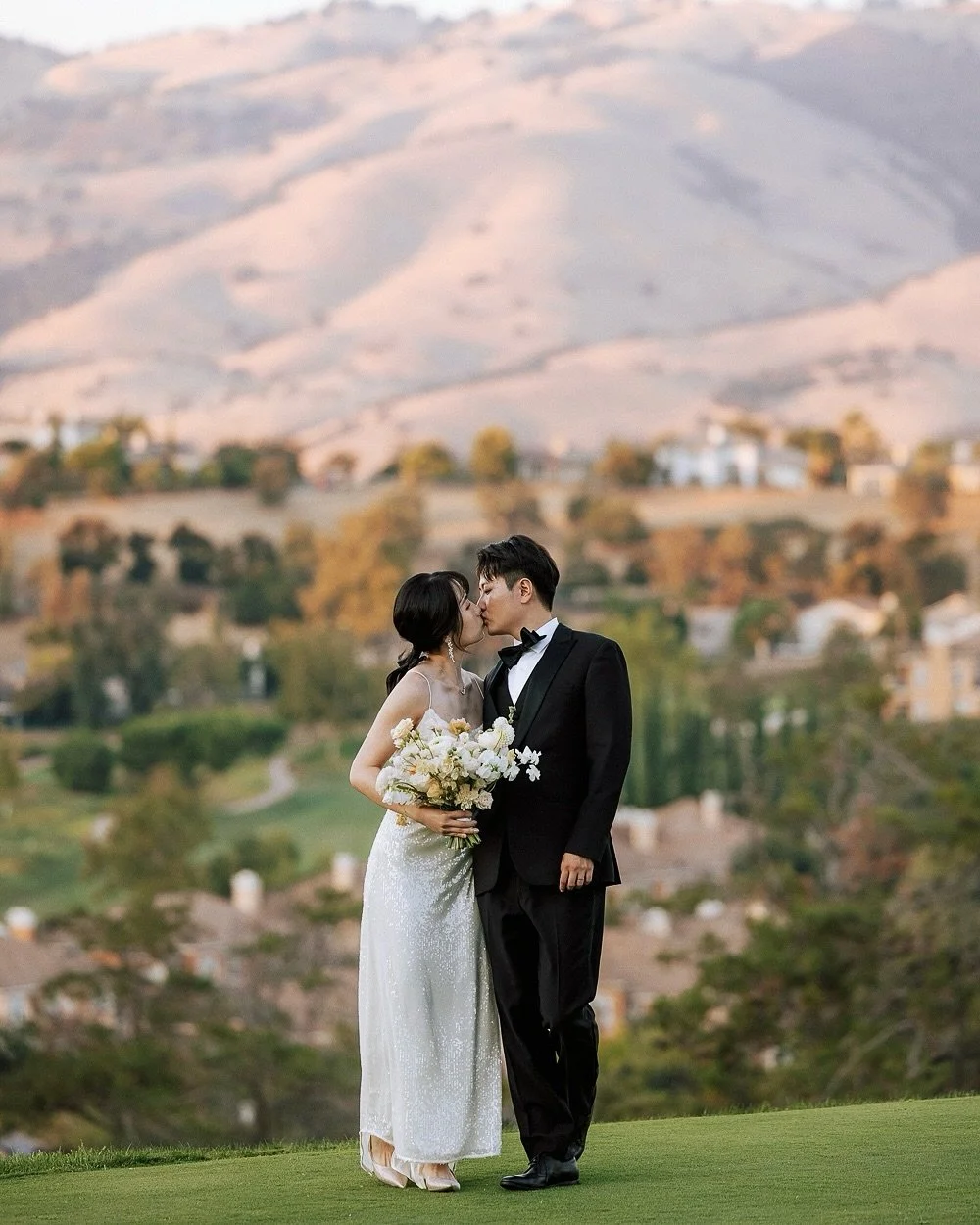 I&rsquo;ve photographed many exclusive clubhouse weddings. I rarely find one to beat the view at Silver Creek Valley Country Club. The incredible falls and elegant, offering a sweeping canvas of mountains and luxury houses in the distance. A truly un