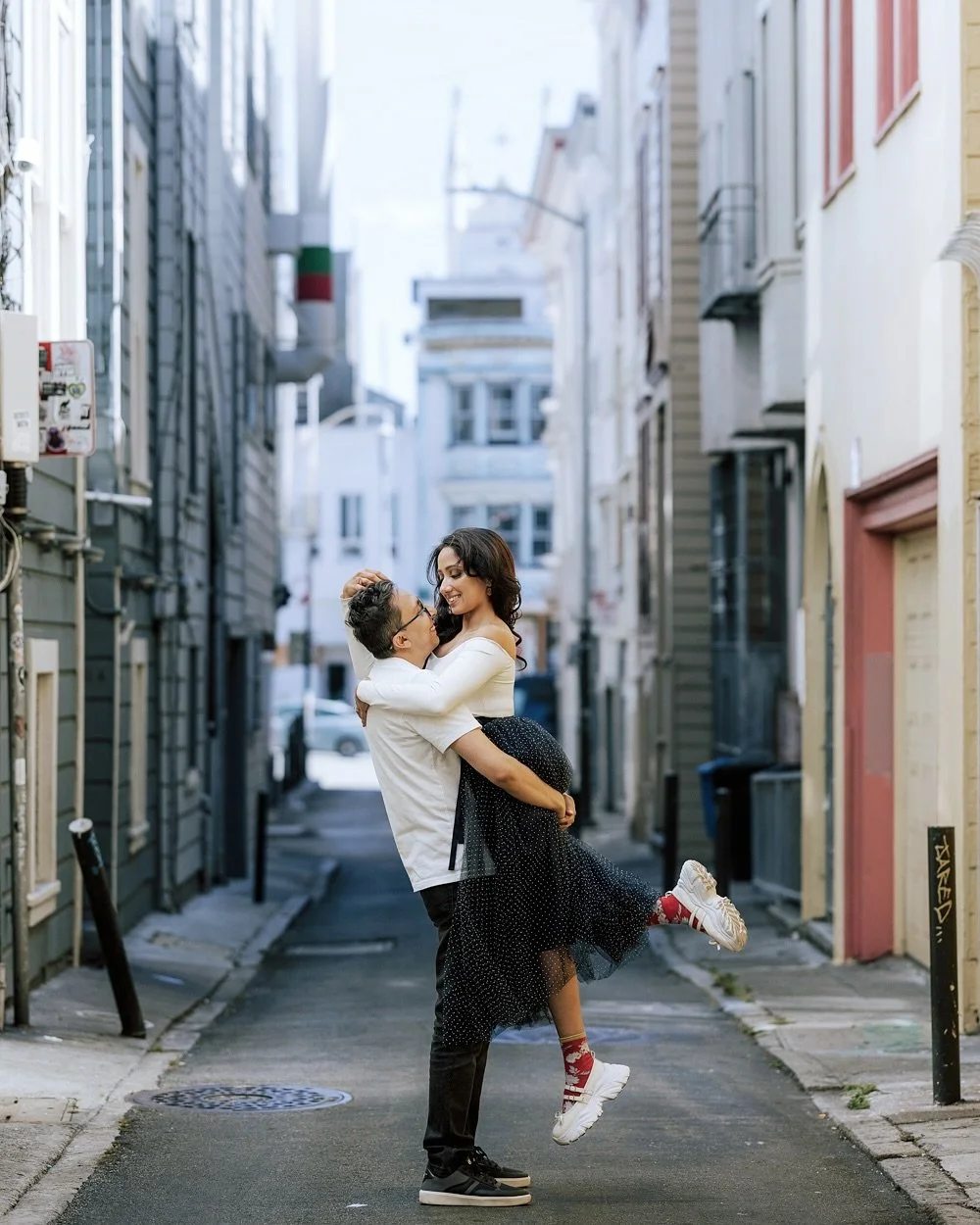 In the heart of North Beach, their story unfolds like a timeless fairytale. From quiet moments over coffee to the climb up Filbert Steps, like a prince visiting his princess in the tower, every corner holds a memory of love. These hills, these street