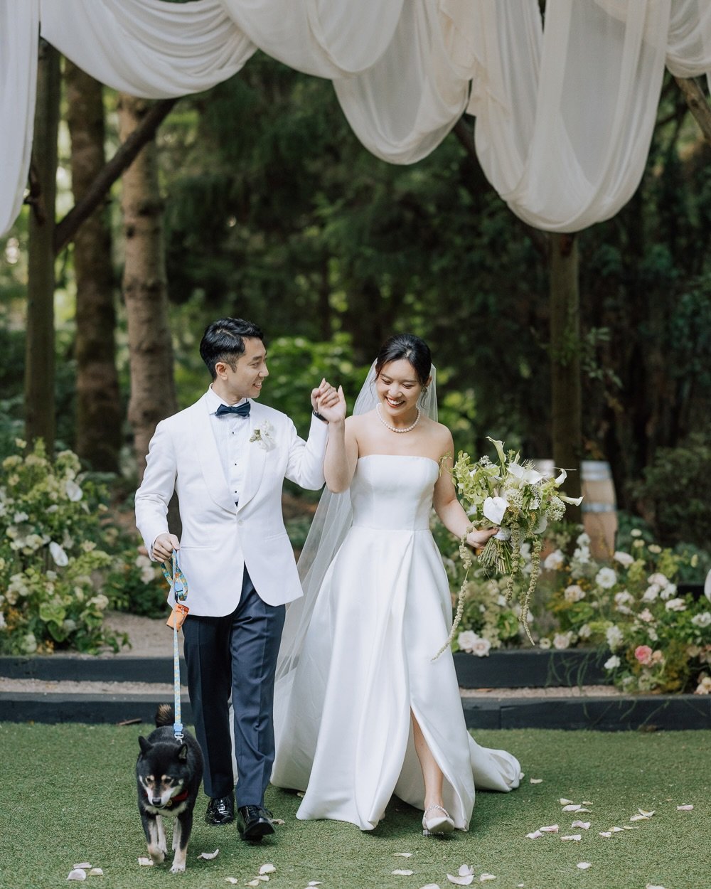 Some stories deserve to be revisited.
Some weddings feel loud. Some feel like a quiet memory unfolding.
The forest was still that afternoon in Seattle. Light moved gently through the trees, conversations softened, and time seemed to slow down &mdash;